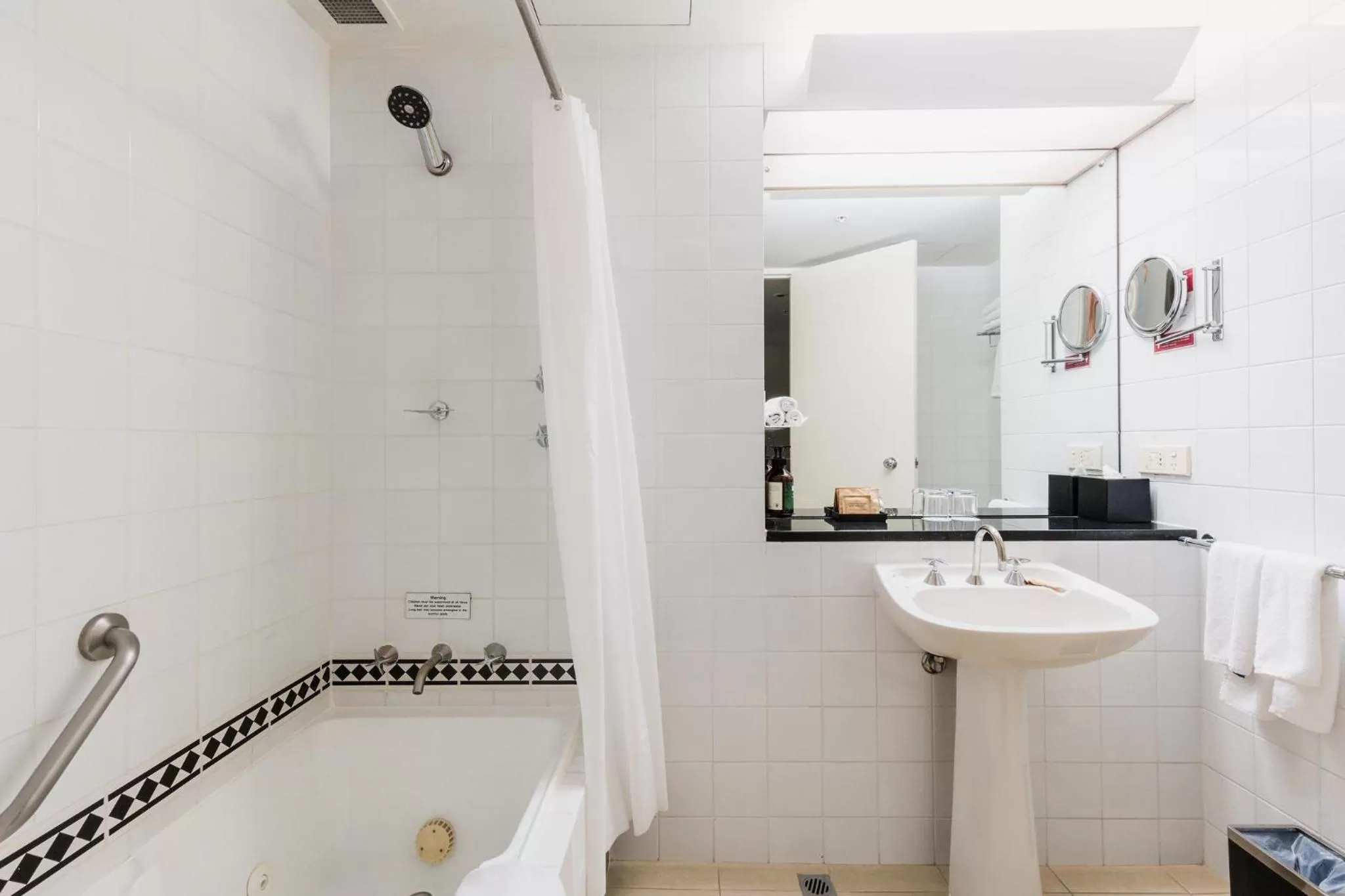 Shower in Crowne Plaza Canberra by IHG