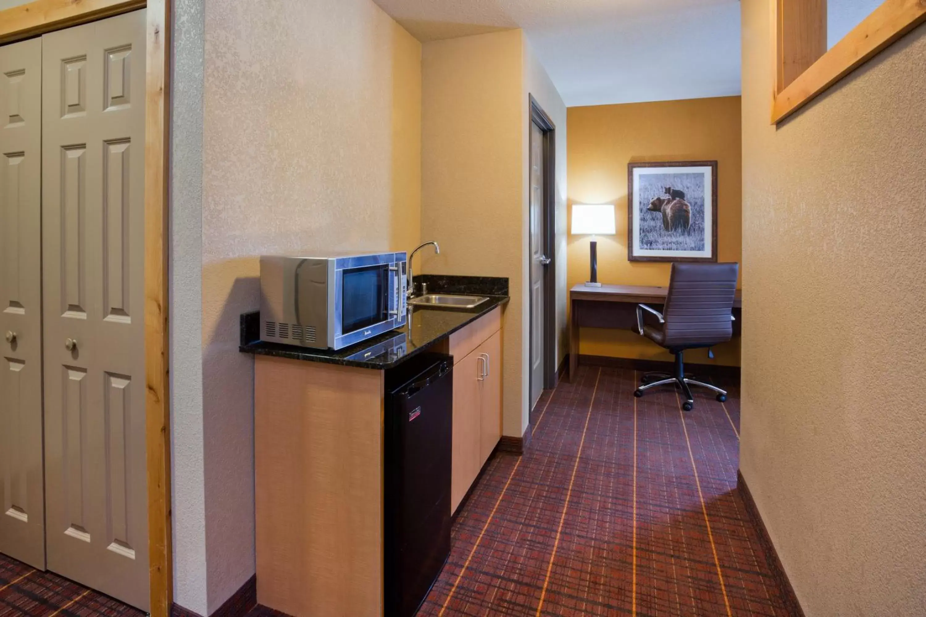 Photo of the whole room, TV/Entertainment Center in Holiday Inn Express Hotel & Suites Brainerd-Baxter, an IHG Hotel