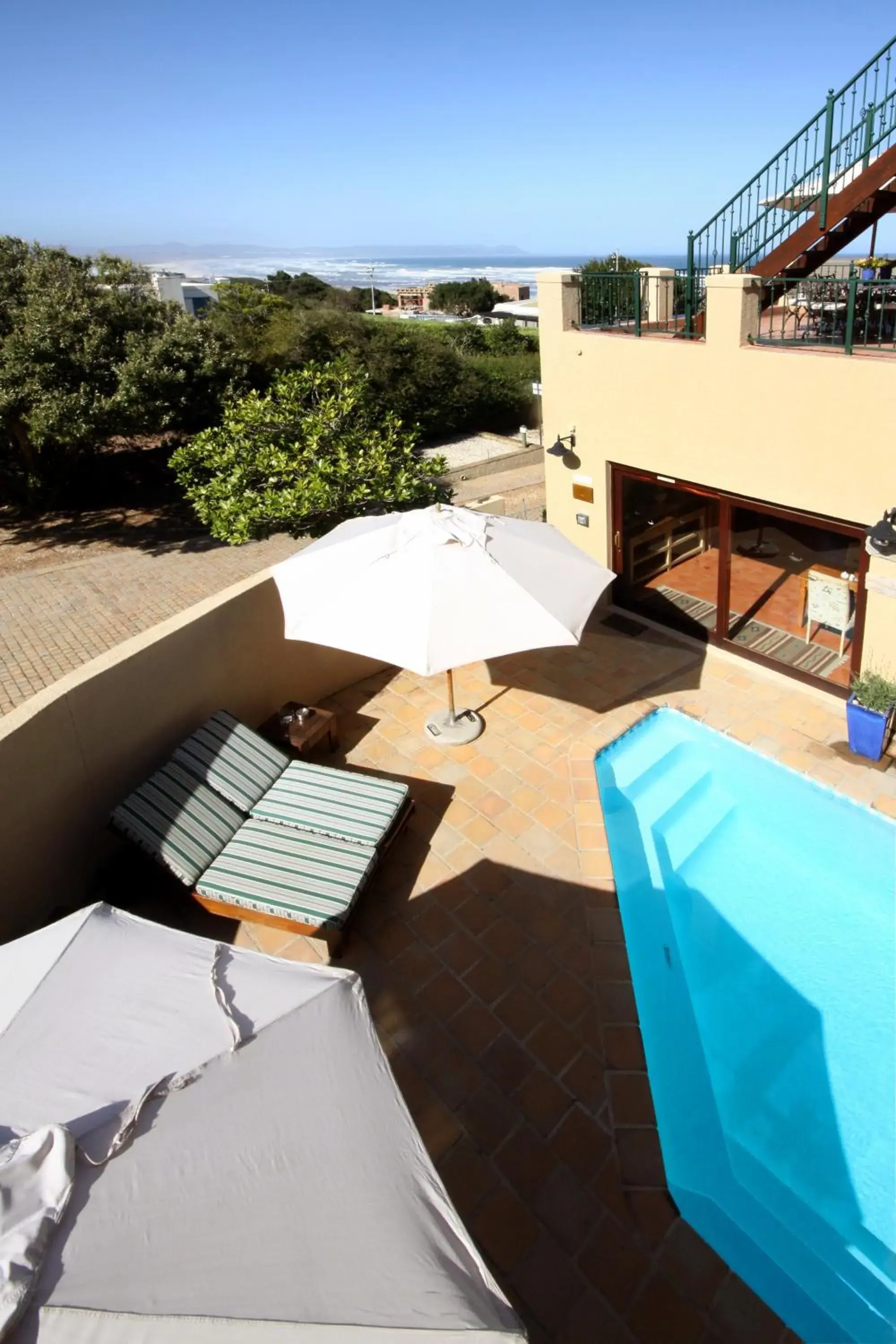 Balcony/Terrace, Pool View in Lavender Manor Guest Lodge