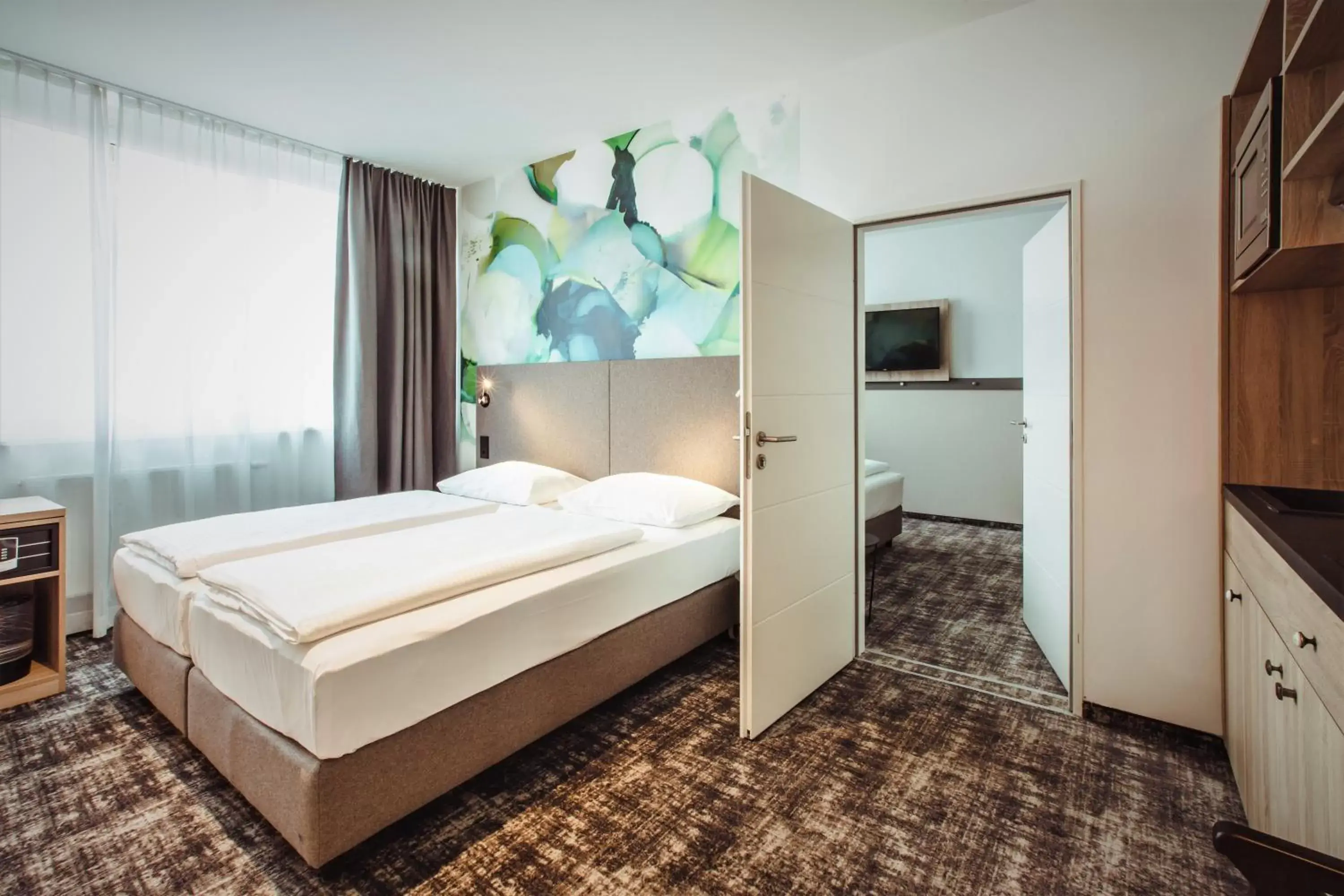 Bed in Wyndham Garden Munich Messe