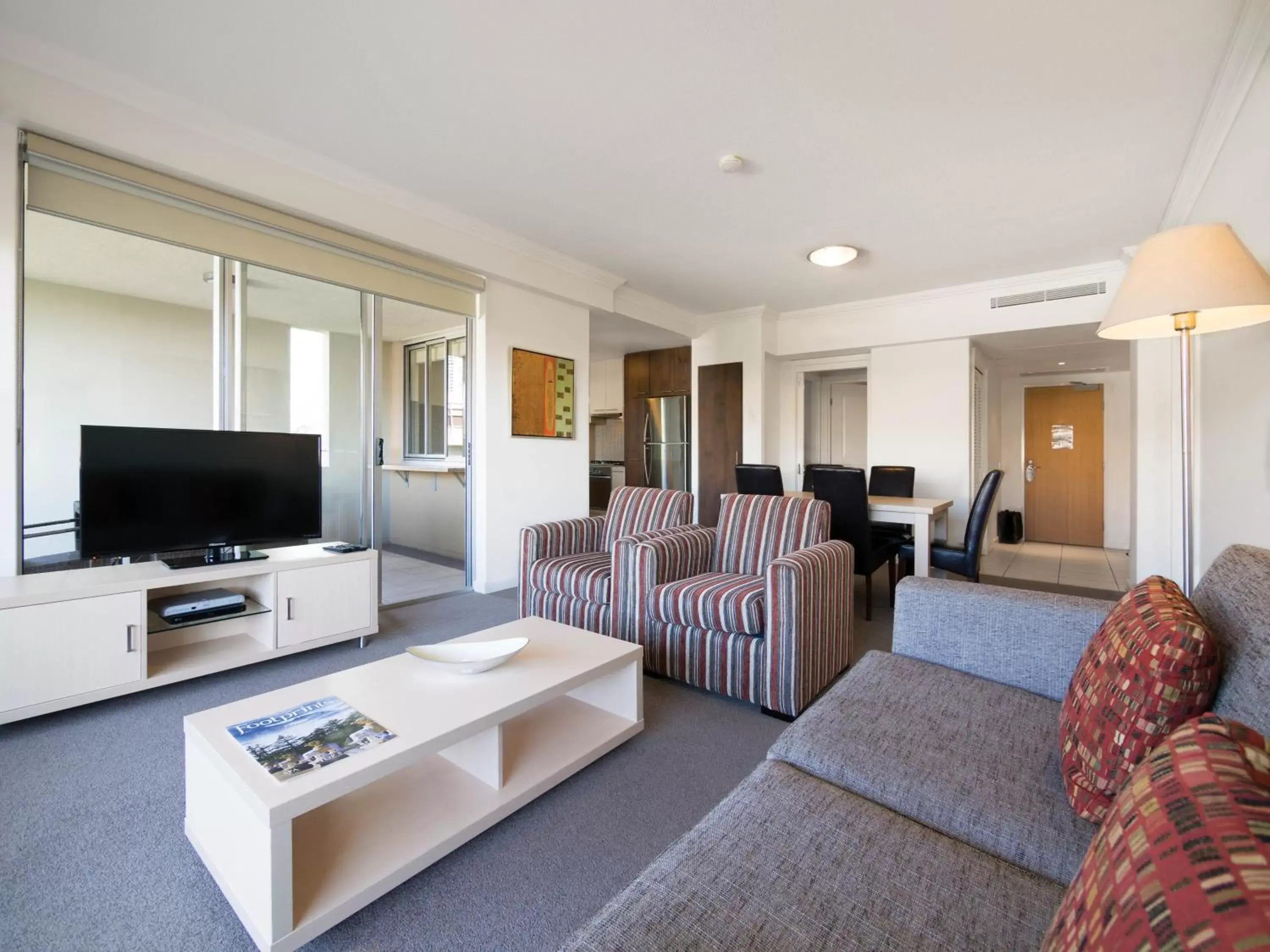 TV and multimedia, Seating Area in Oaks Brisbane Mews Suites