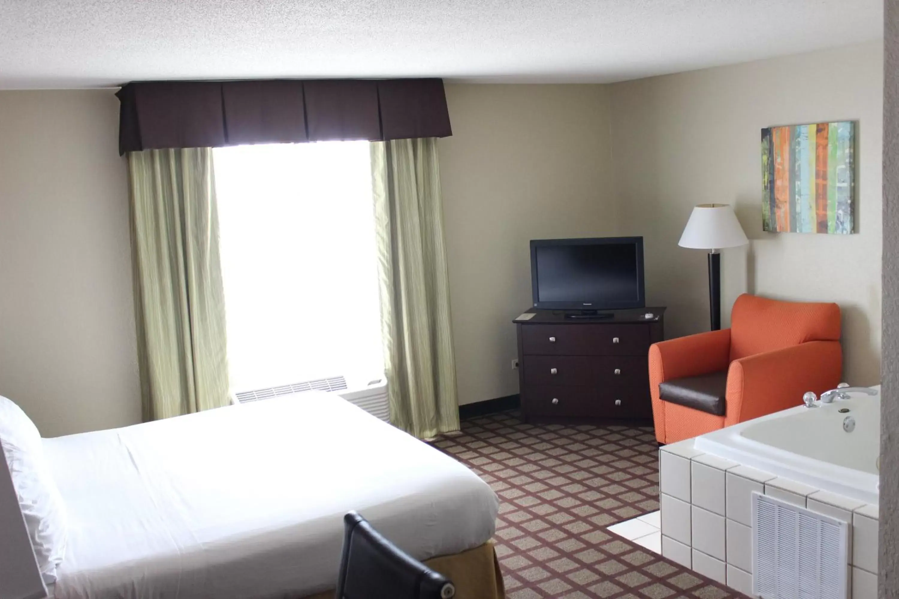 Photo of the whole room, TV/Entertainment Center in Holiday Inn Express Hotel & Suites Chicago-Algonquin, an IHG Hotel