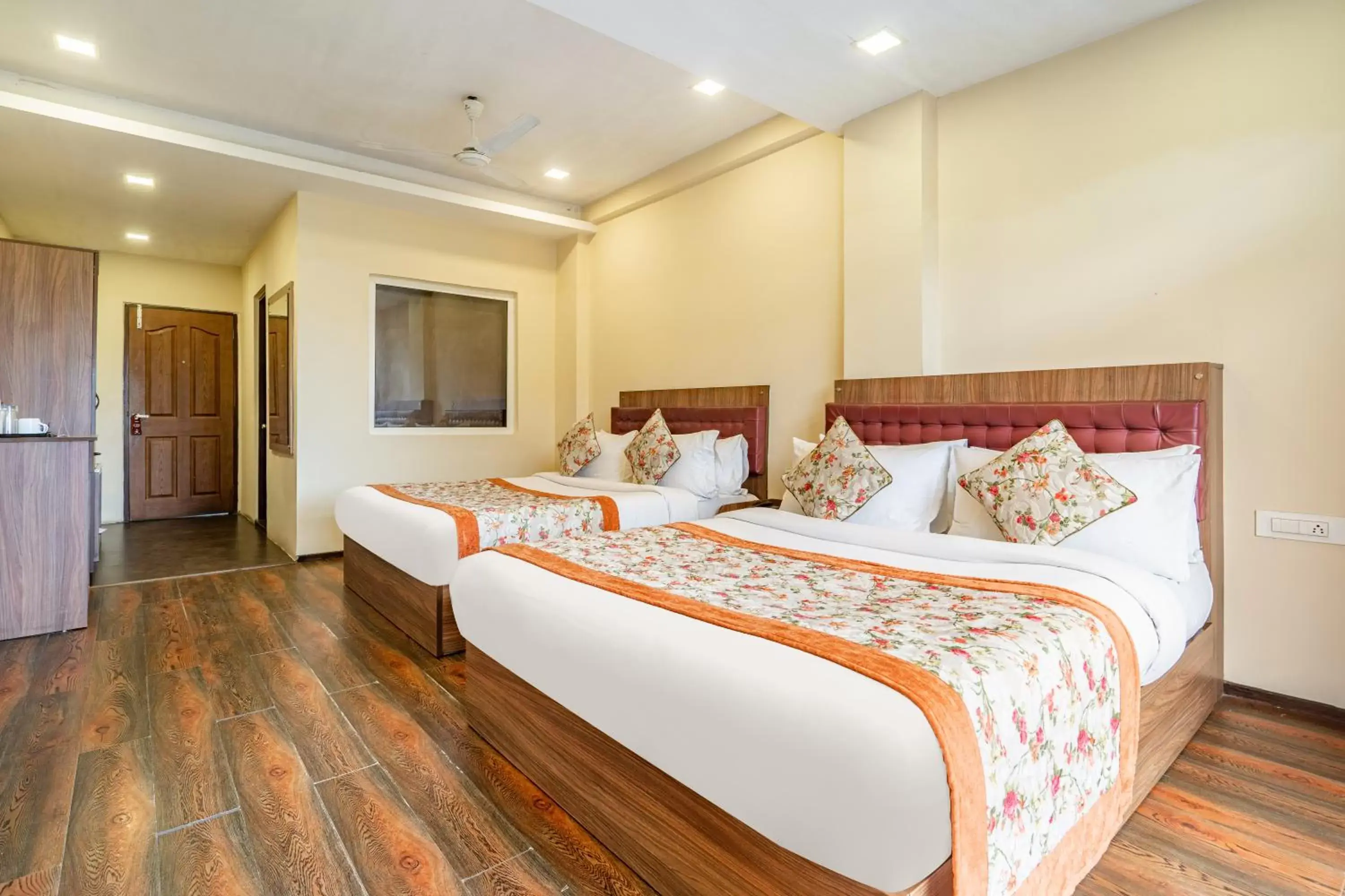 Bed in Summit Barsana Resort & Spa