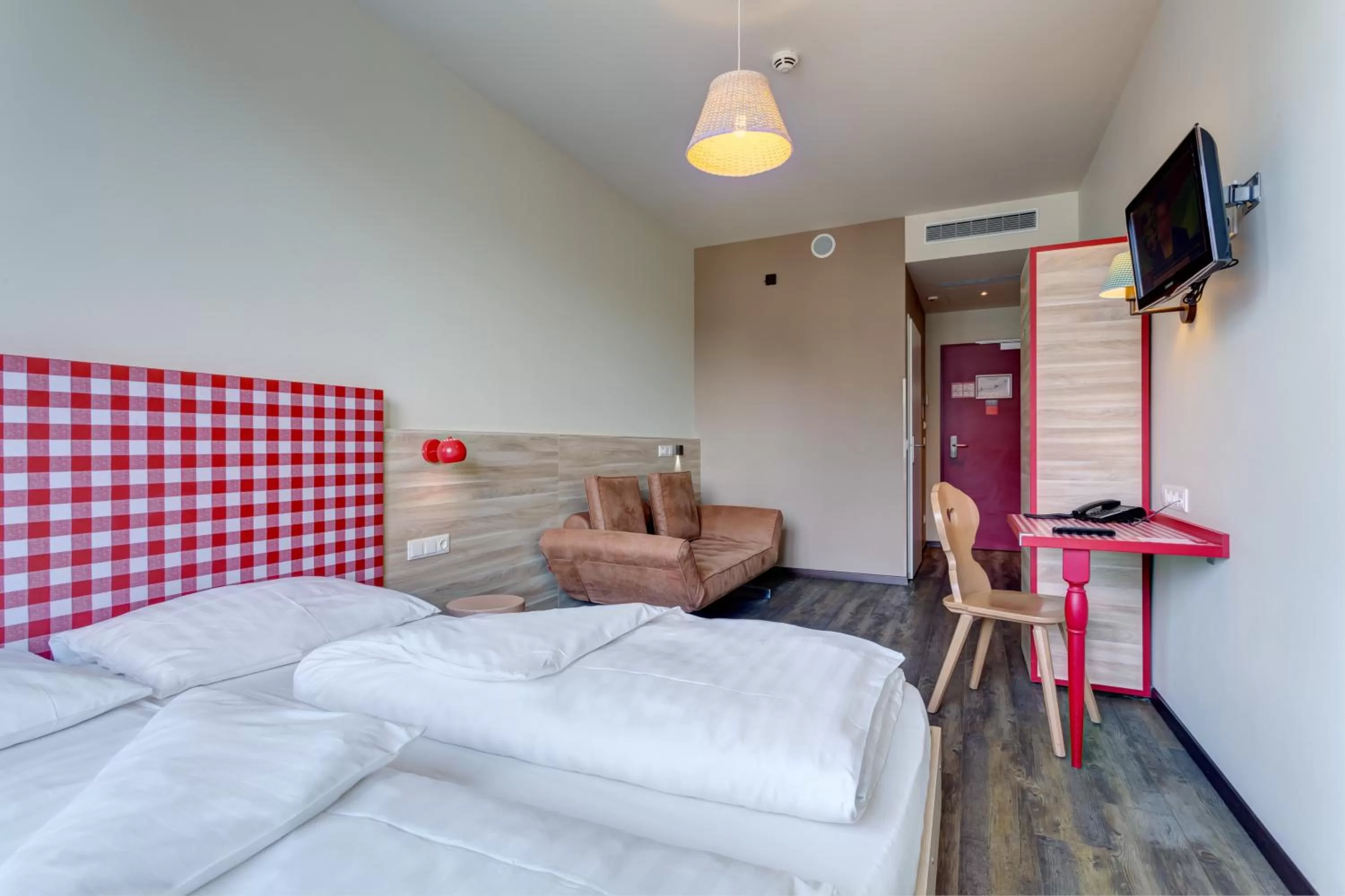 Photo of the whole room, Bed in MEININGER Hotel Salzburg City Center