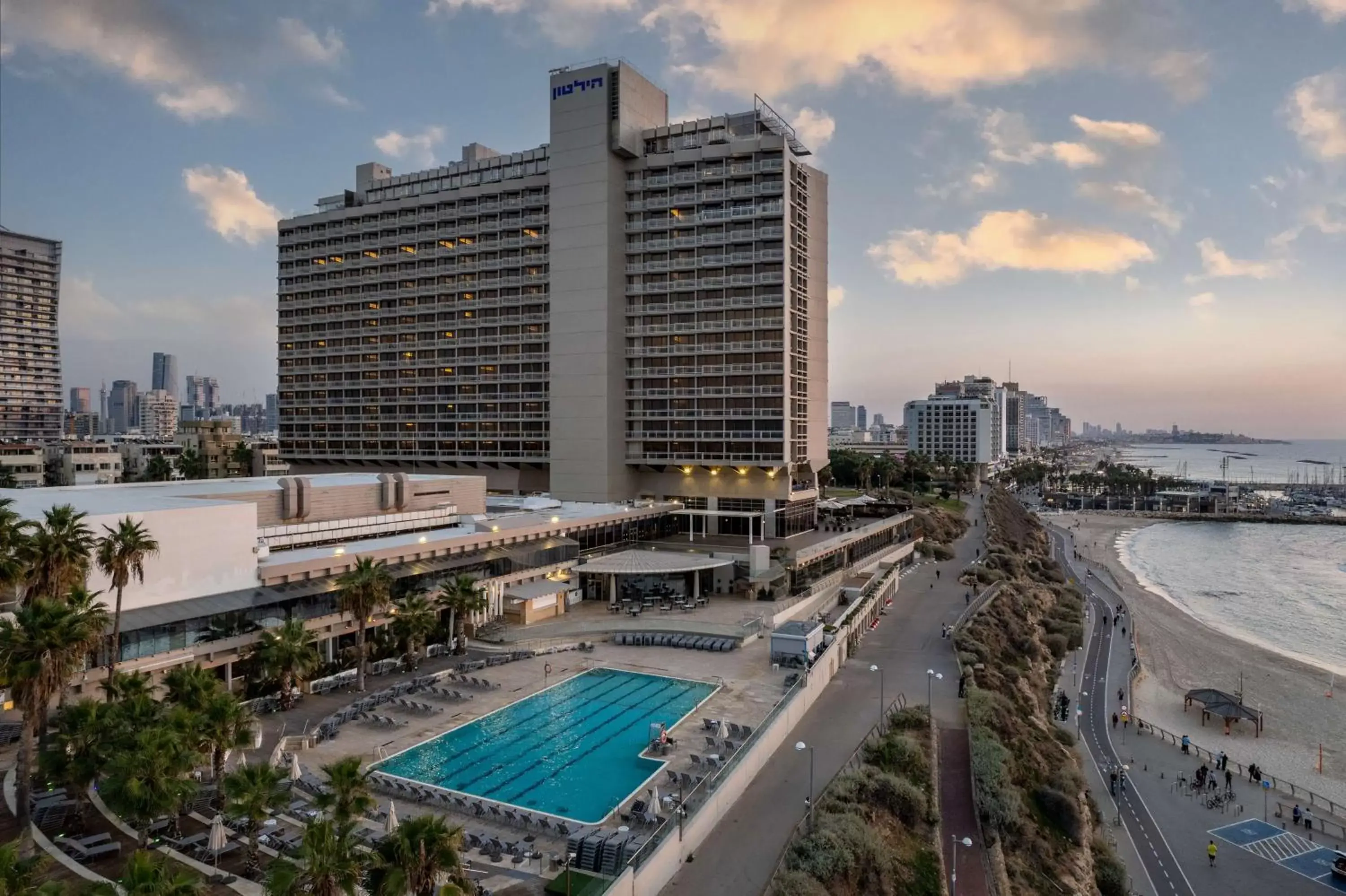 Property building, Swimming Pool in Hilton Tel Aviv Hotel