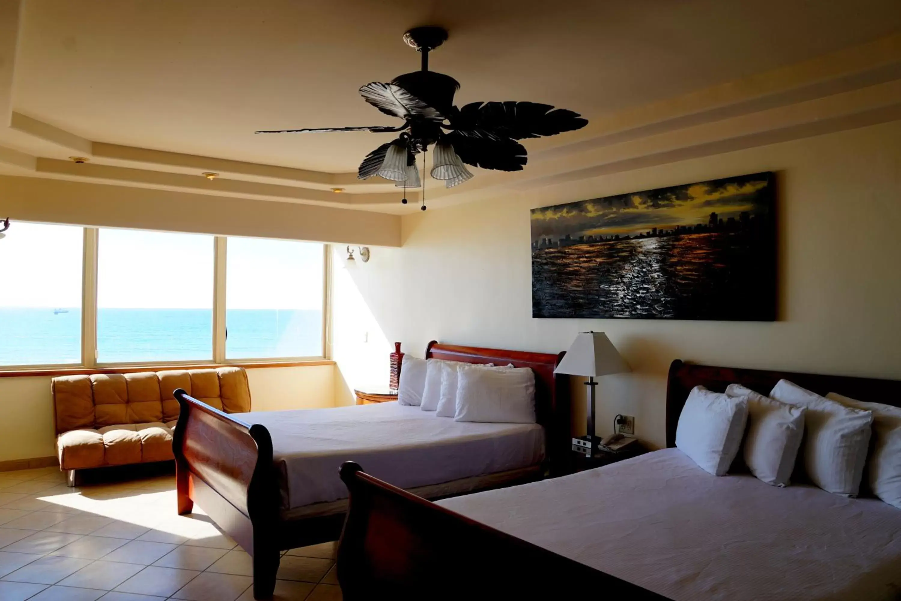 Bed, Seating Area in Hotel Playa Bonita Resort