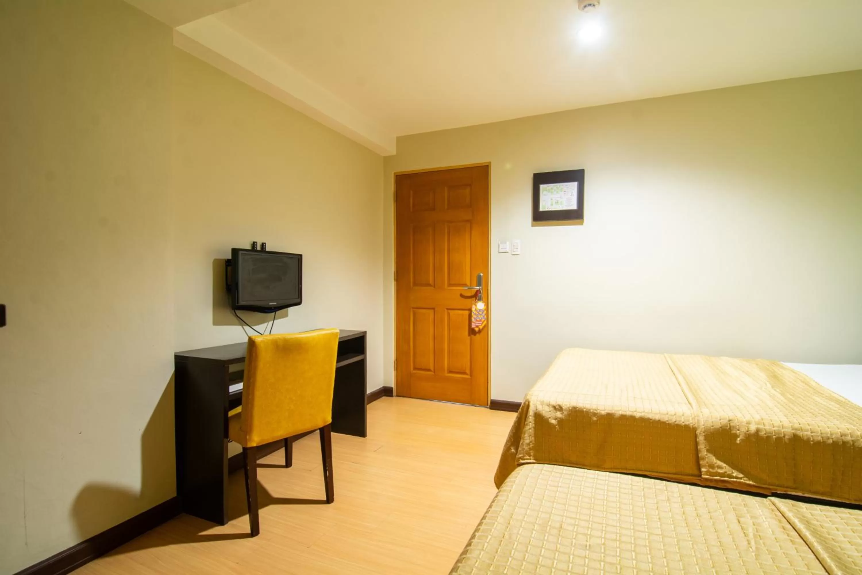 Bed in Festive Hotel Makati