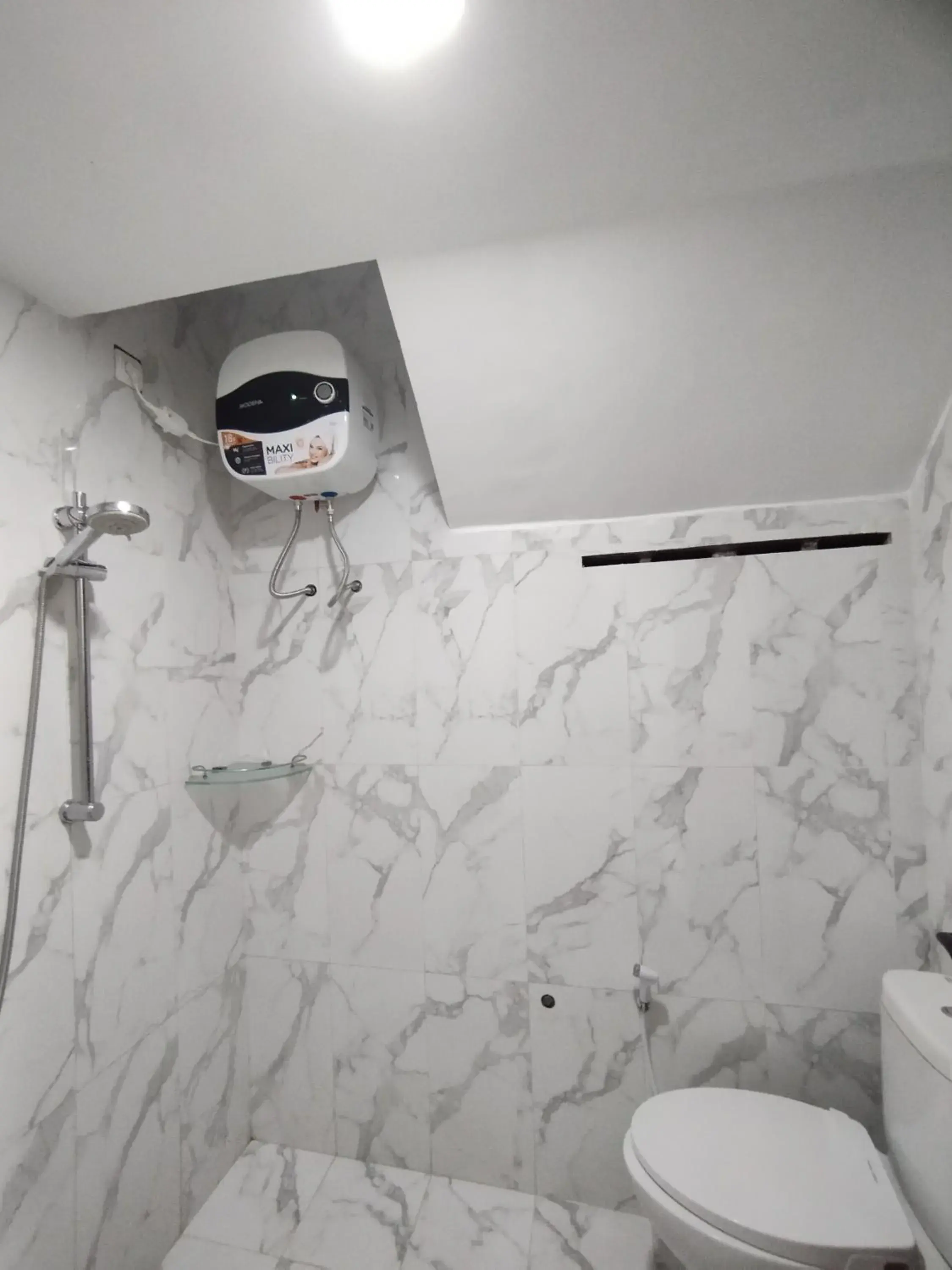 Shower, Bathroom in Saira Hotel dan Homestay Syariah