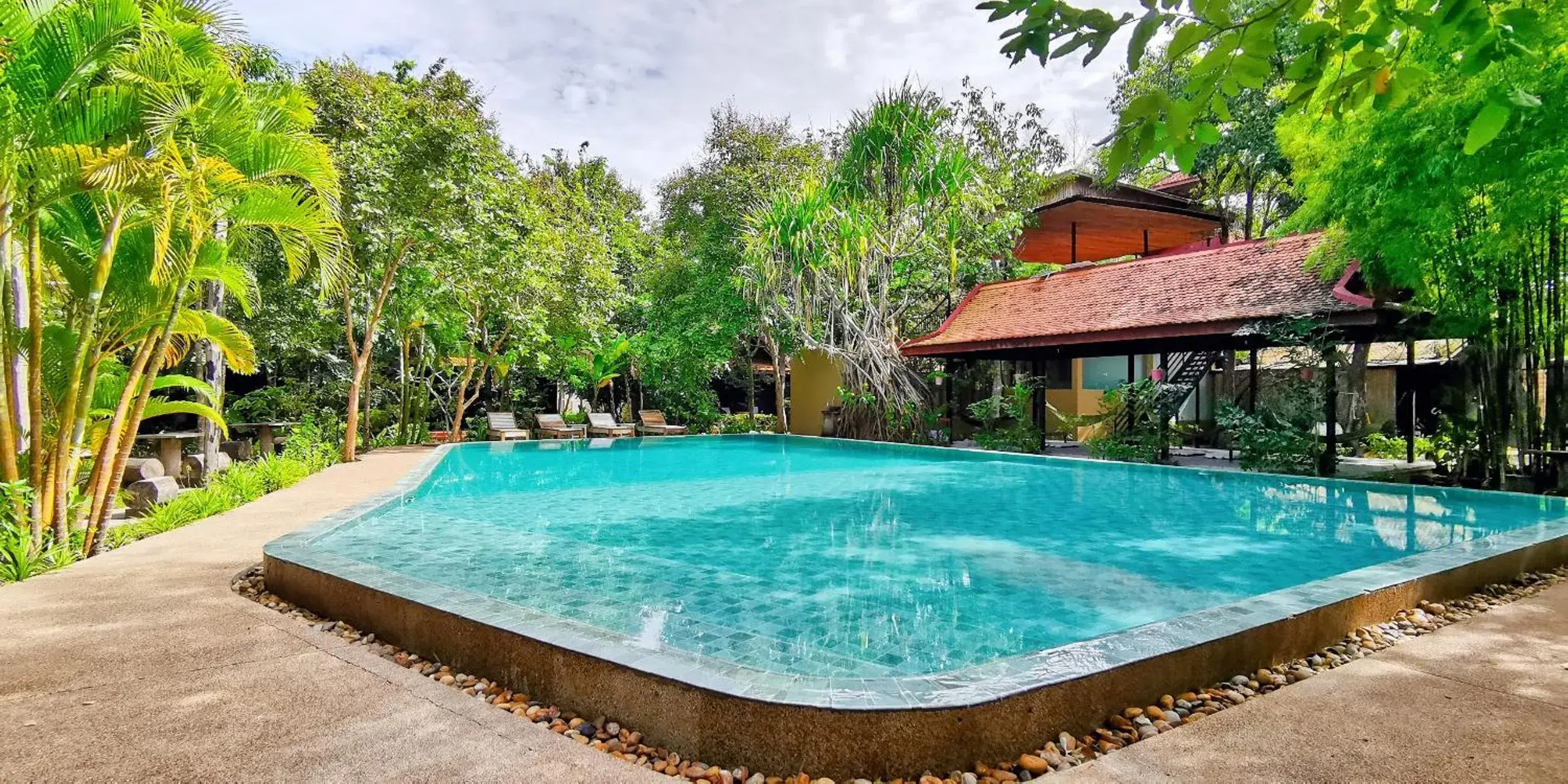 Swimming Pool in Palm Village Resort & Spa