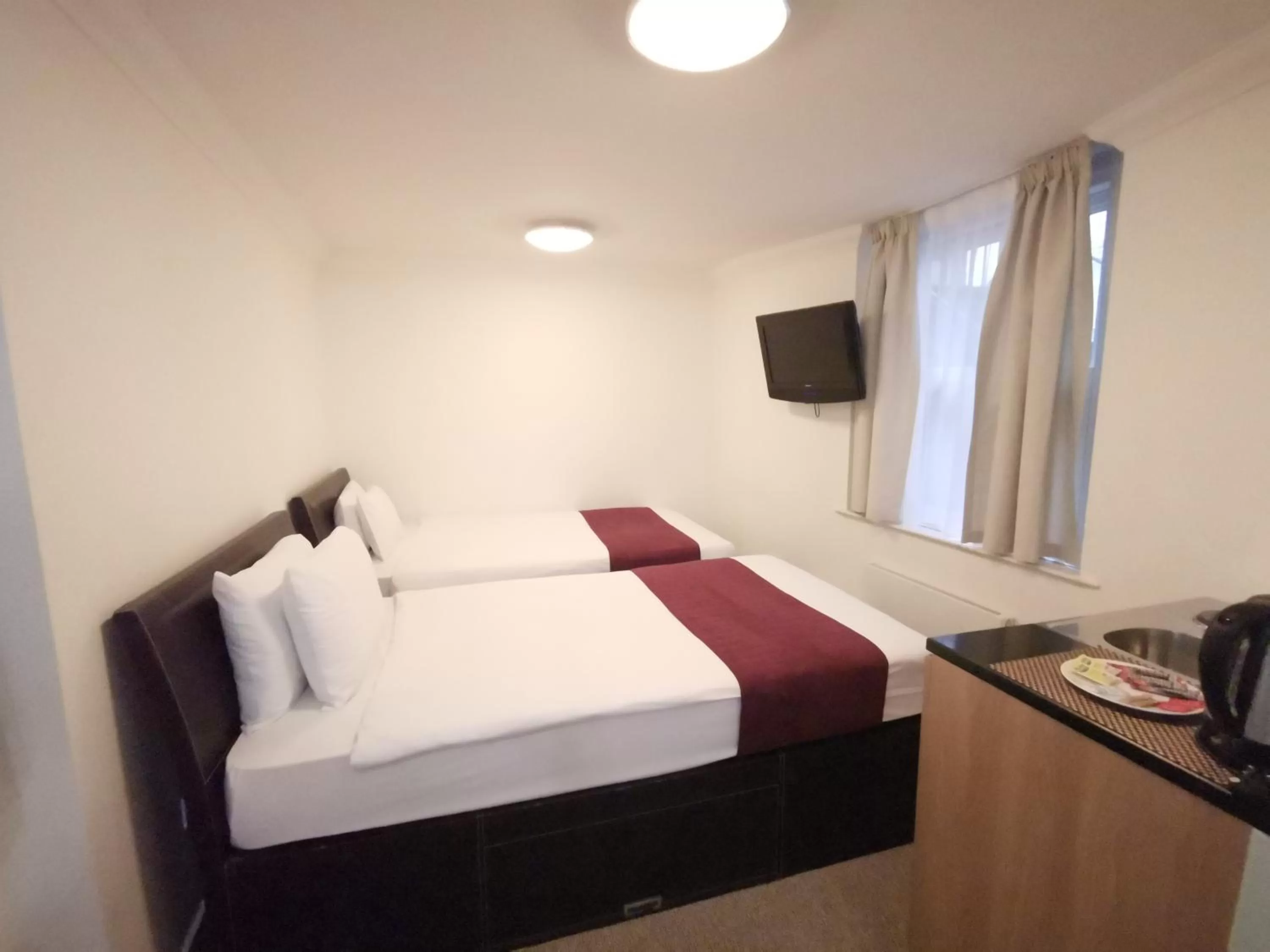 Bed in The Royale Chulan Hyde Park Hotel