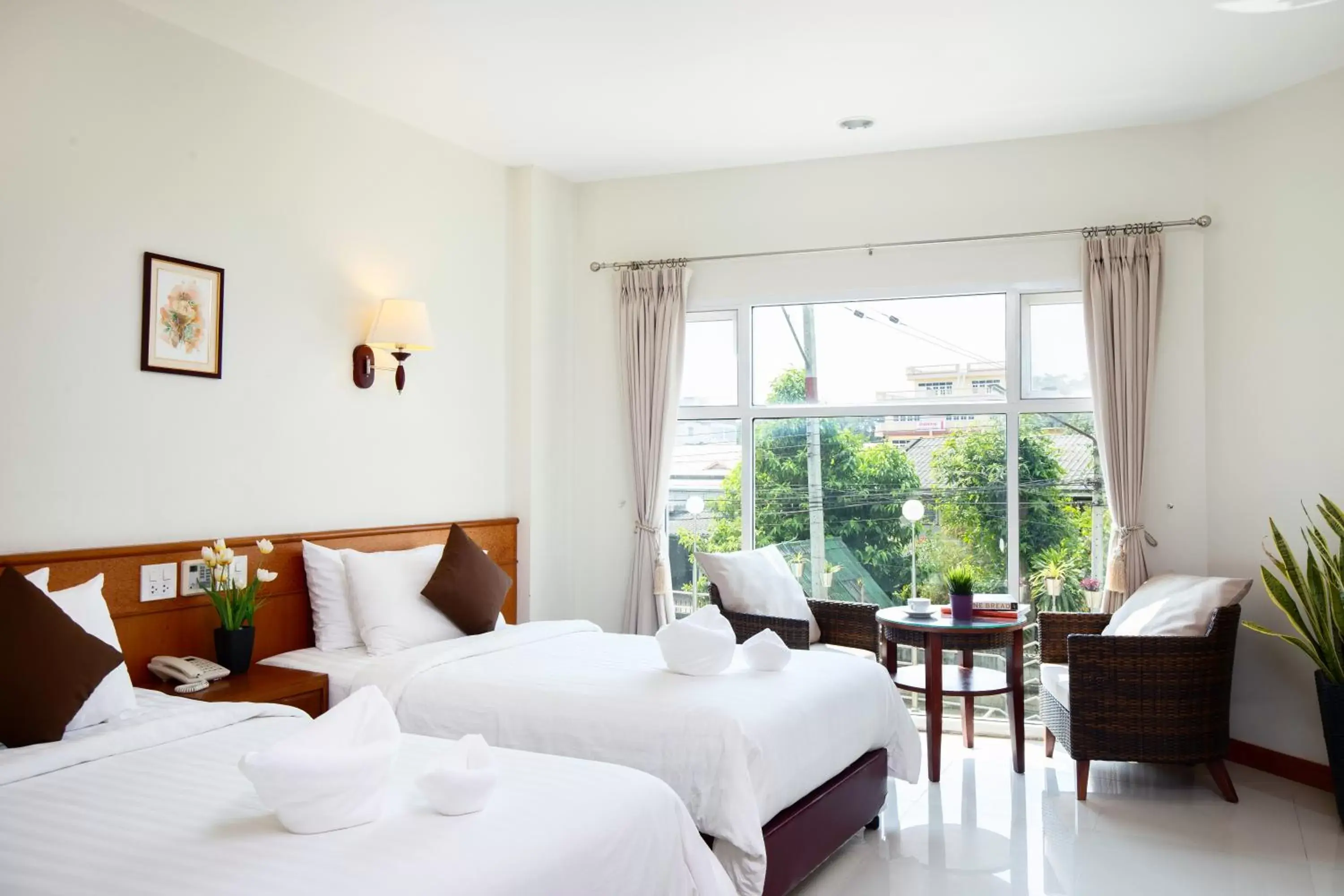 Bed in Kanchanaburi City Hotel - SHA Extra Plus