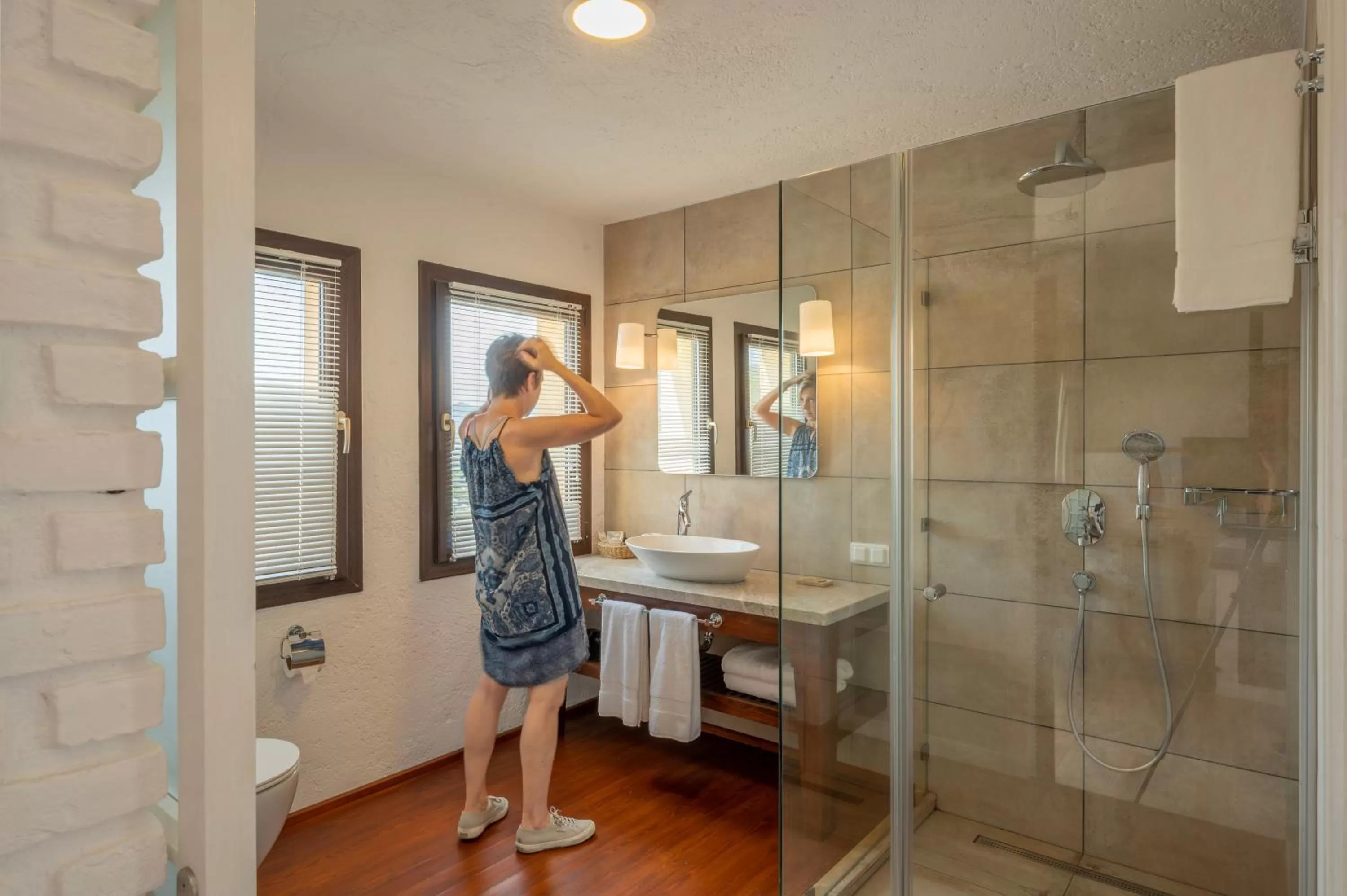 Bathroom in 4reasons hotel + bistro | 12+