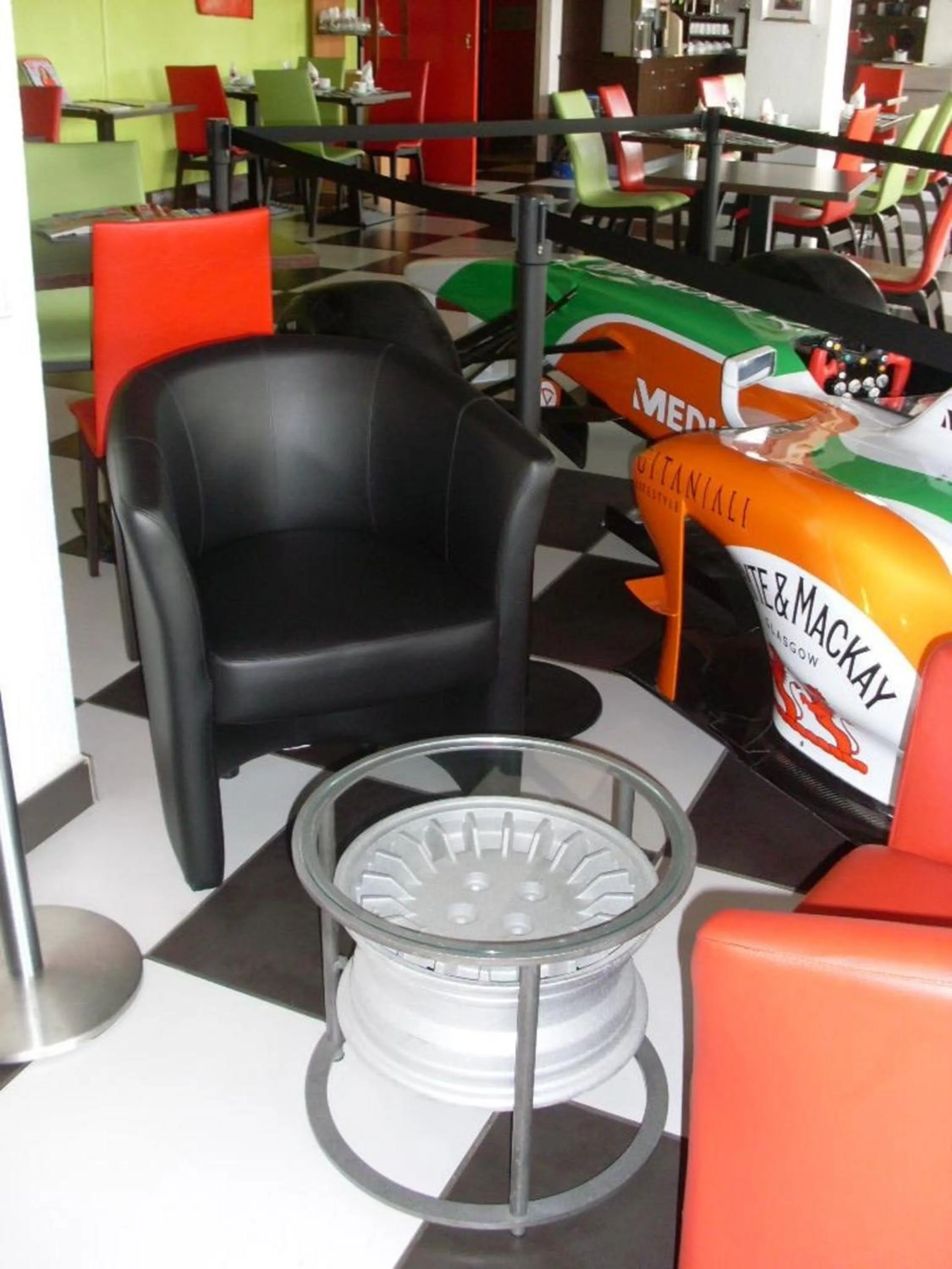 Seating area in Enzo Hotels Vierzon by Kyriad Direct