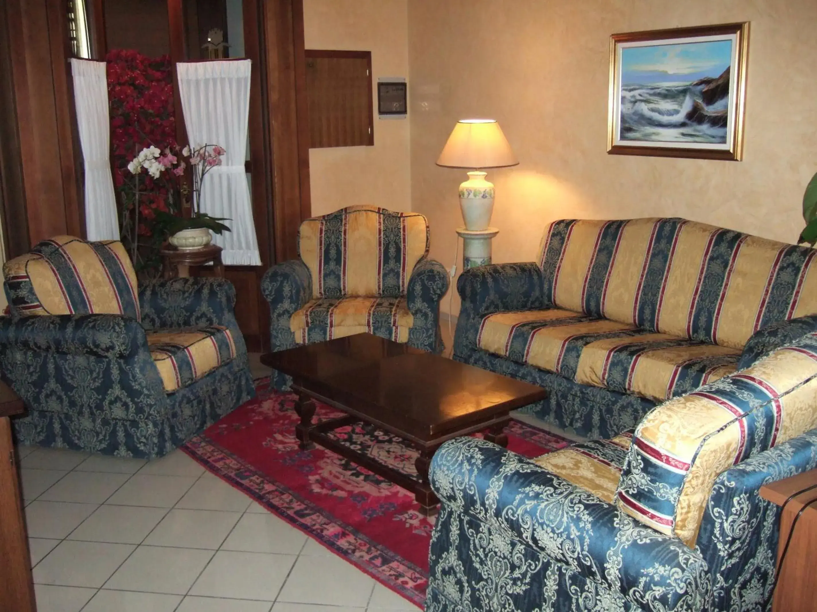 Communal lounge/ TV room, Seating Area in Hotel La Torre