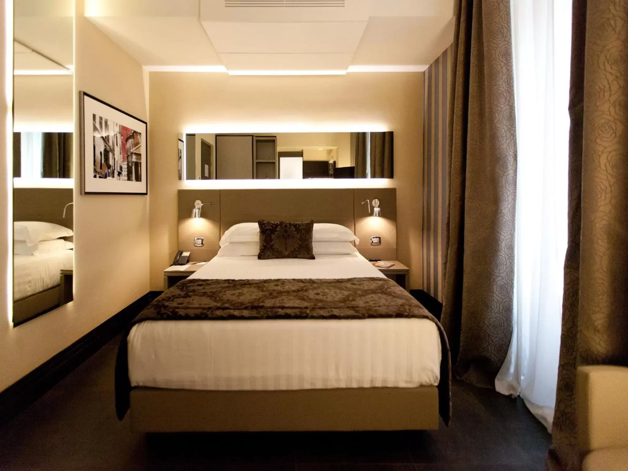 Bed in Quirinale Luxury Rooms