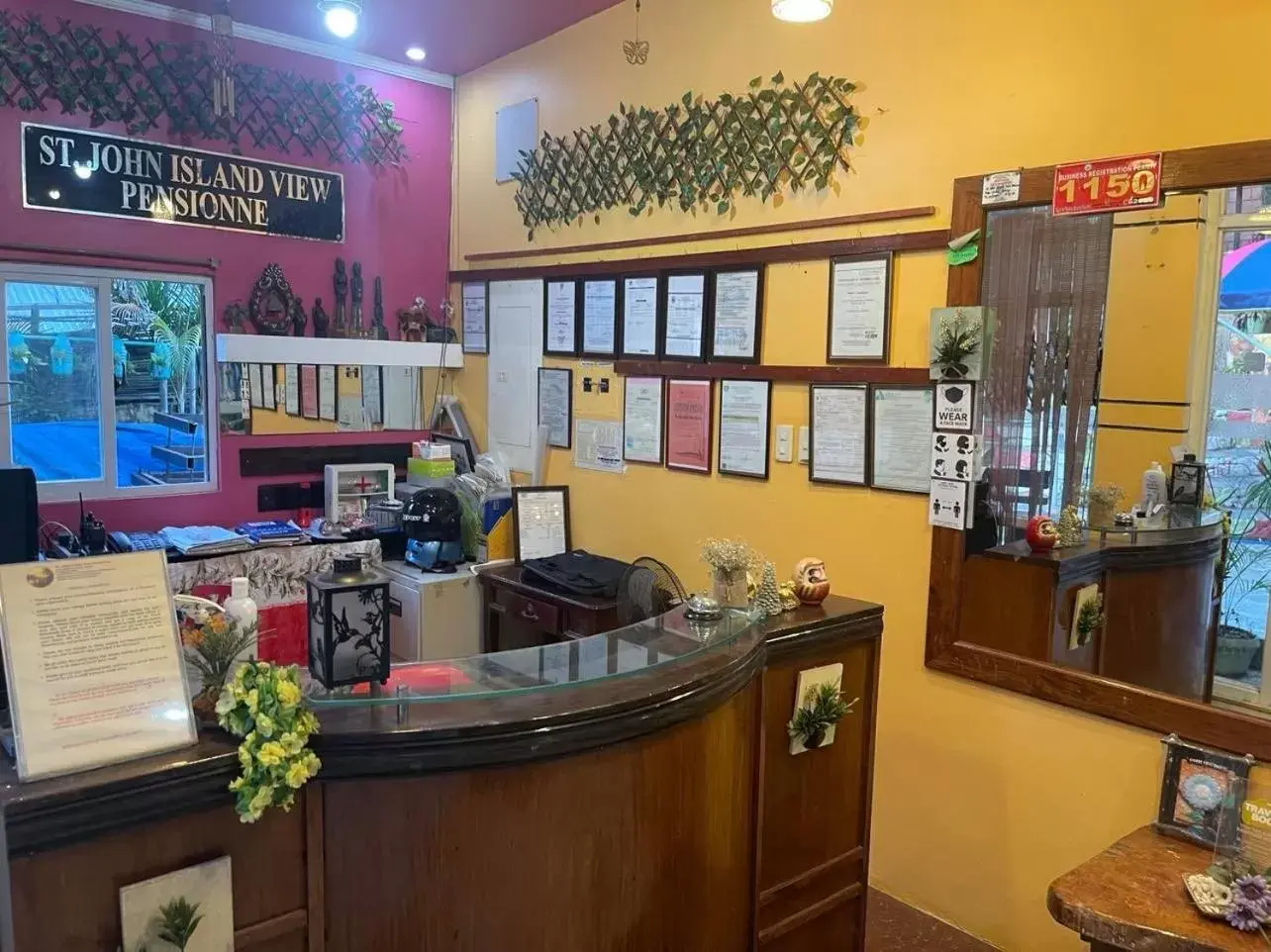 Property logo or sign in St. John Island View Pensionne Property logo or sign in St. John Island View Pensionne