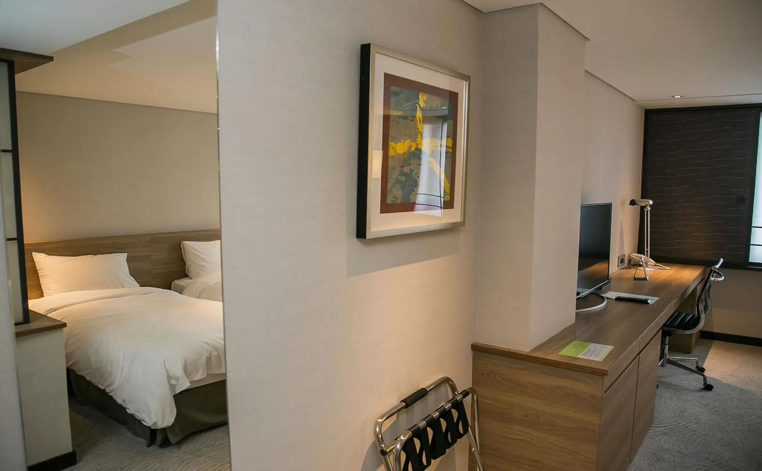 Decorative detail, Bed in Royal Inn Taipei Nanxi - MRT Zhongshan Station