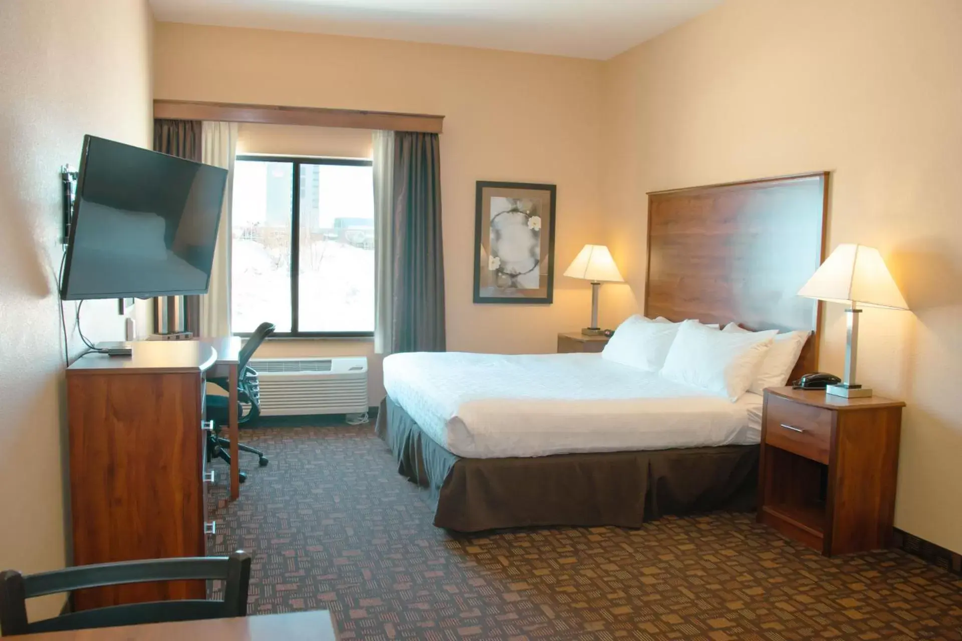 Bed in Expressway Suites of Grand Forks