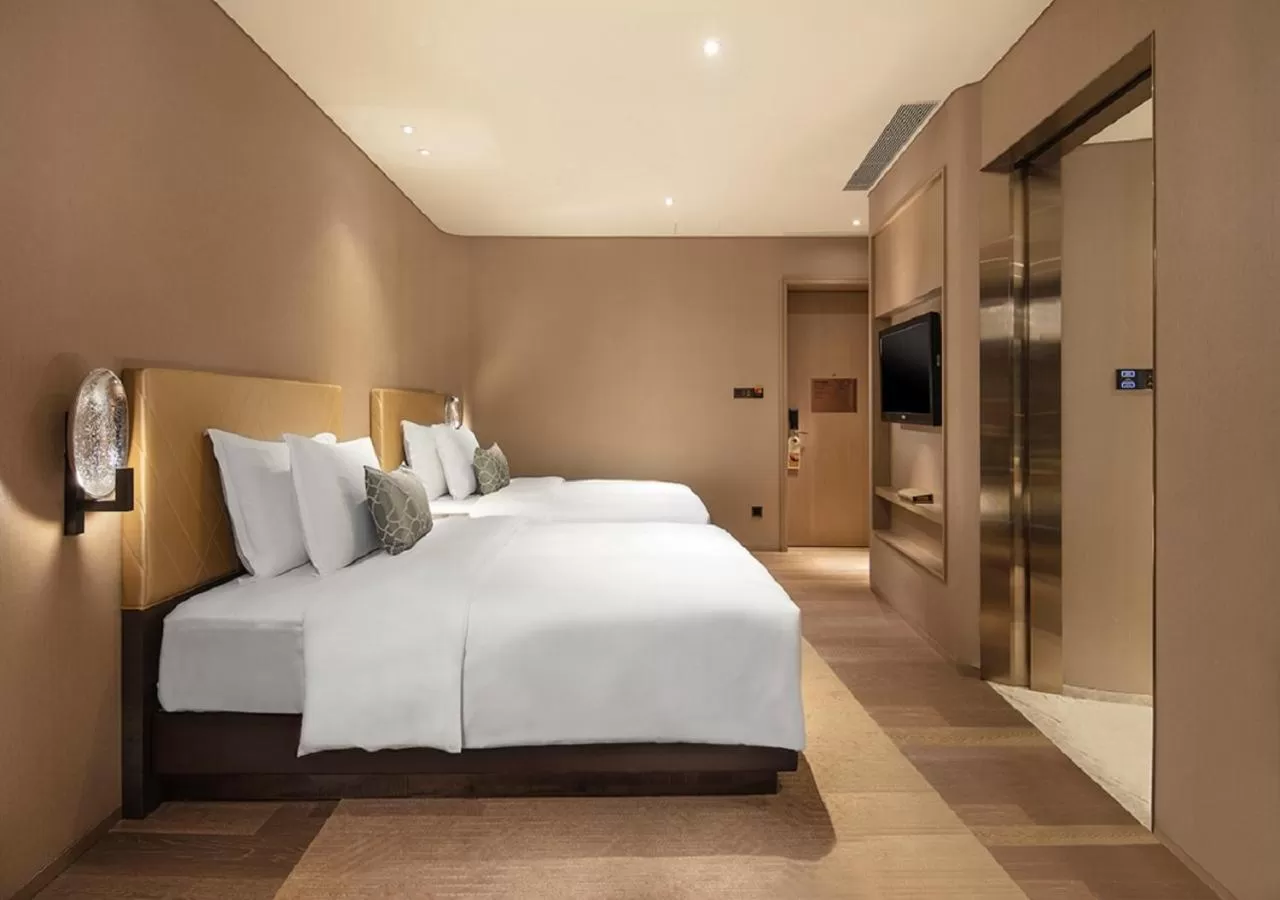 Bed in Grand Bay Hotel Zhuhai