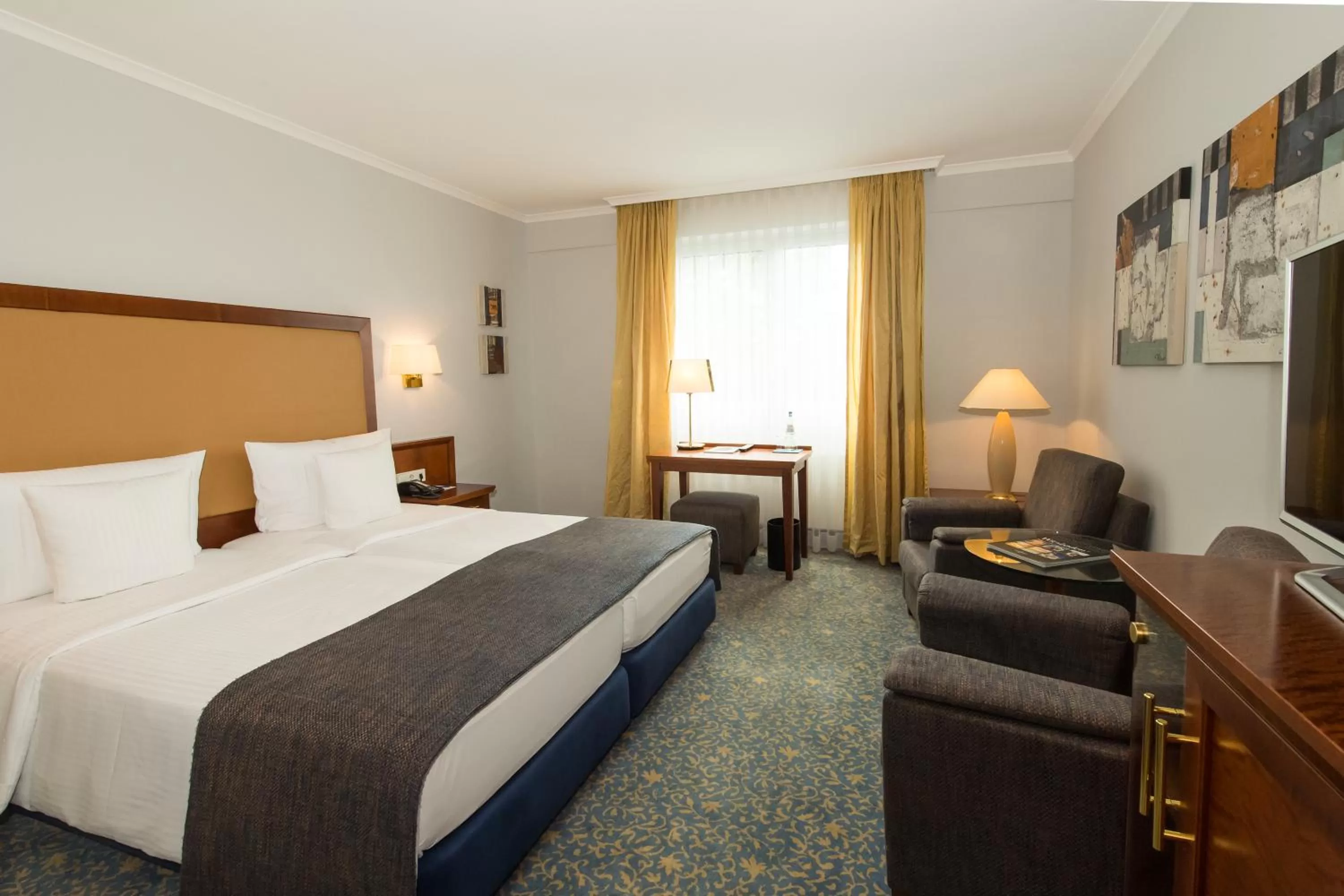 Photo of the whole room, Bed in Hotel Oranien Wiesbaden