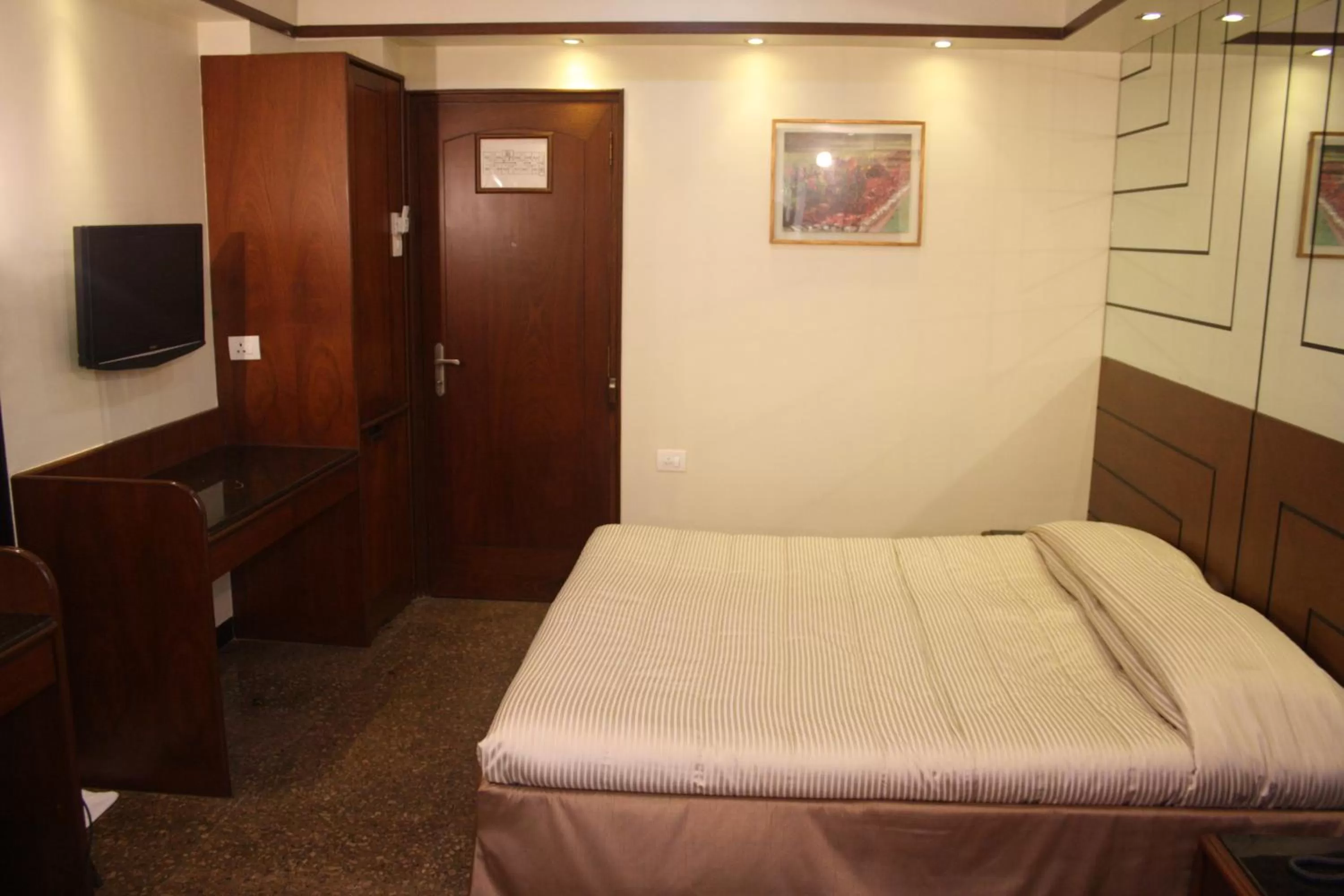 Photo of the whole room, Bed in Hotel Karl Residency