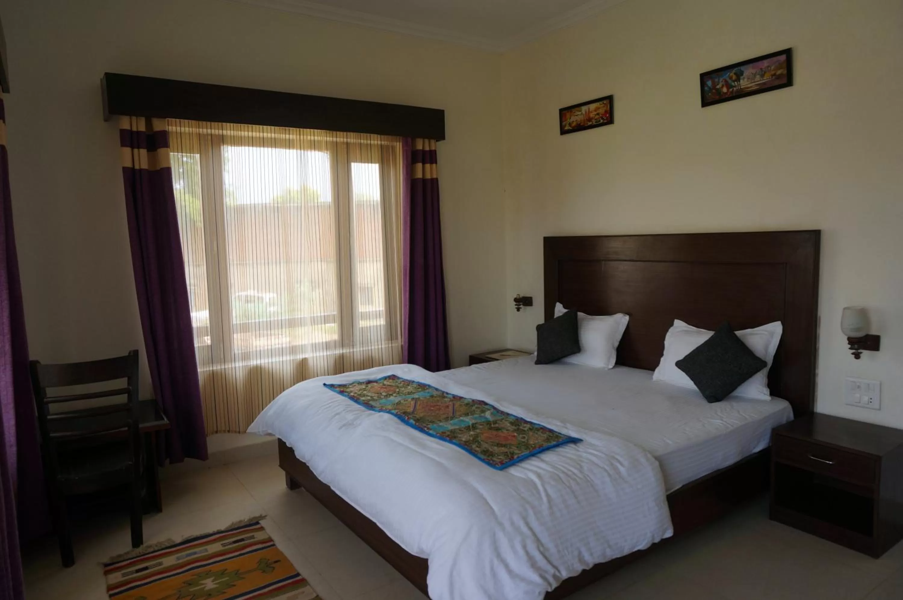 Bed in Hotel Ramayana Khajuraho