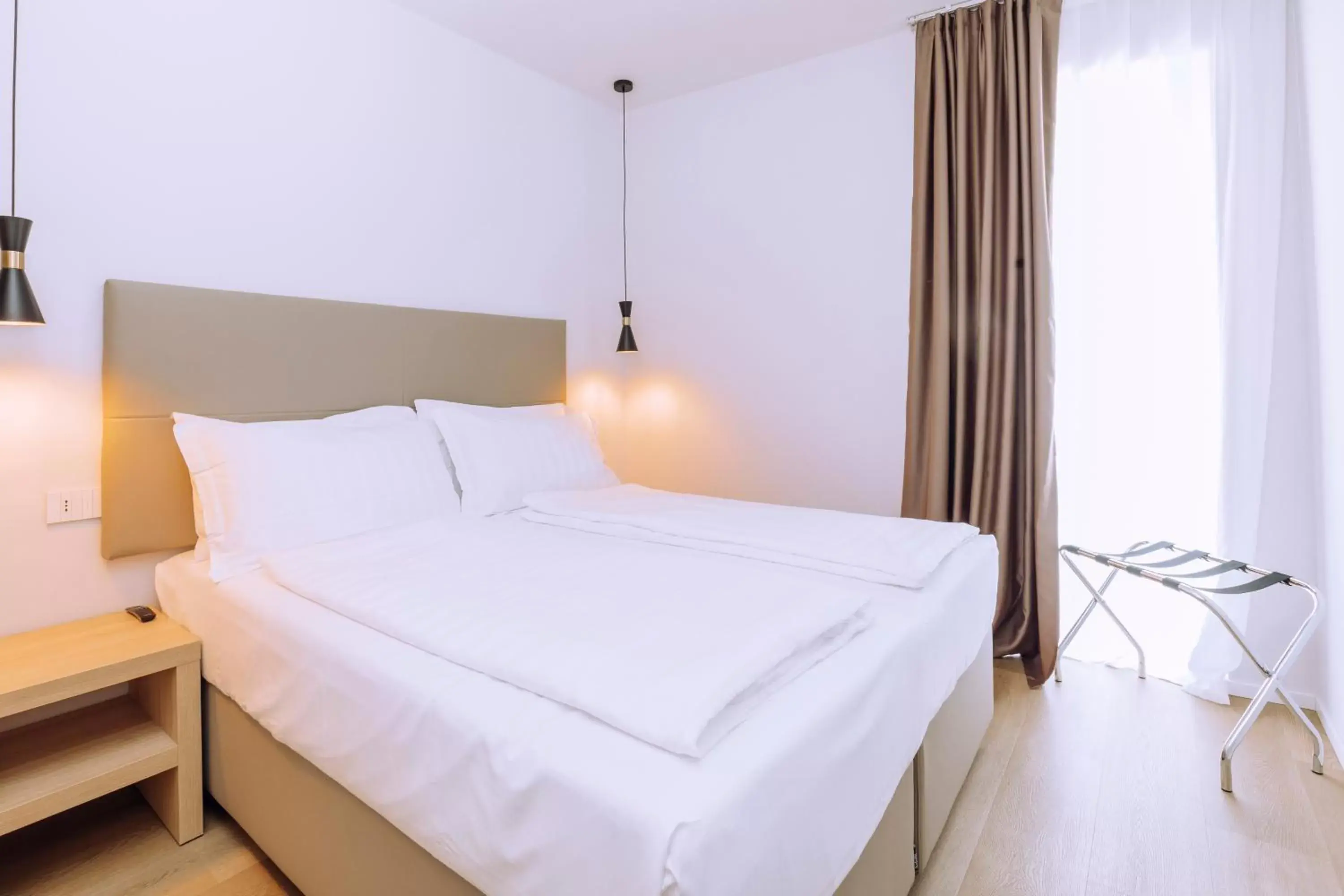 Bed in Ah Porticcioli Boutique Apartments