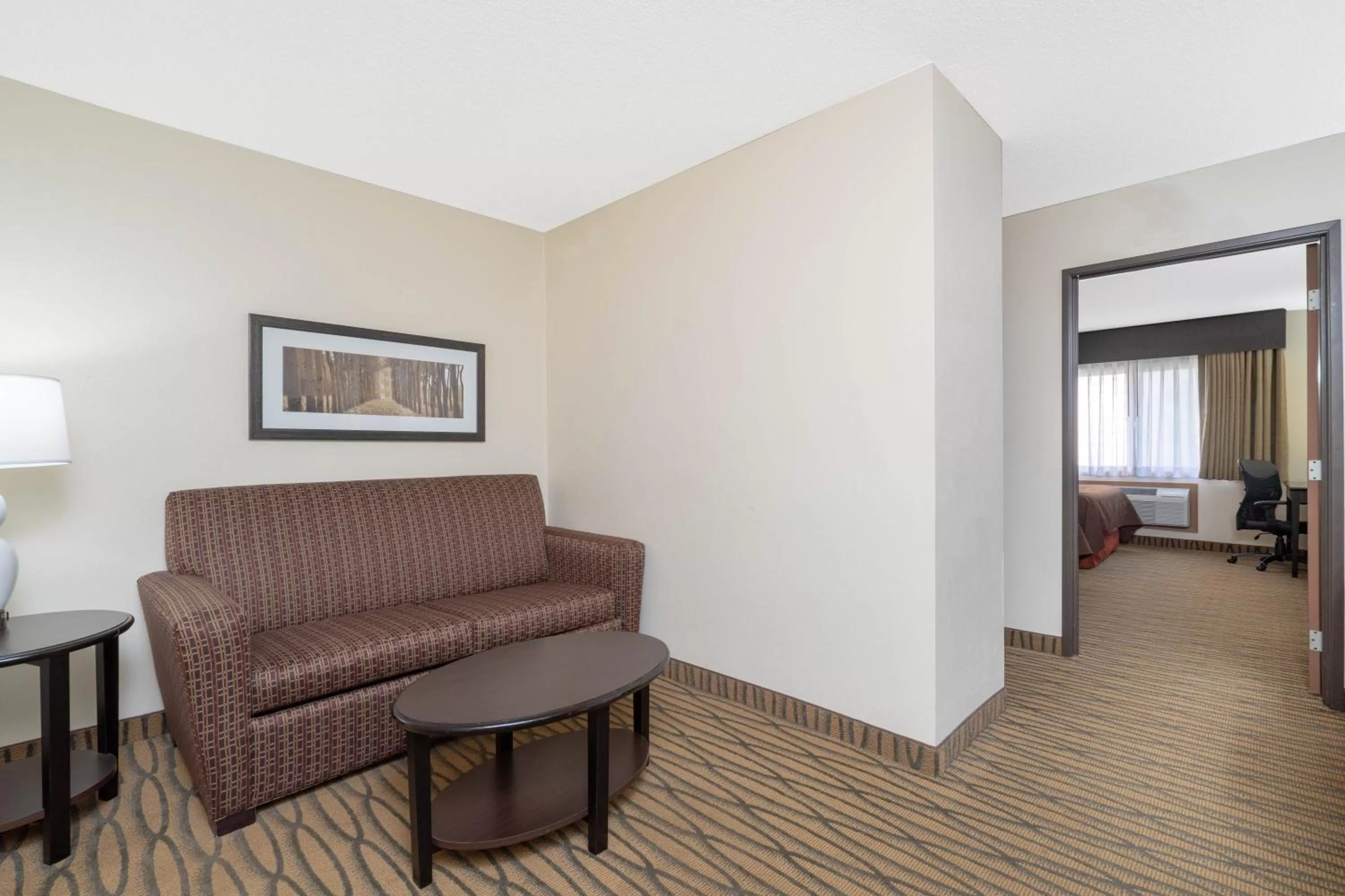 Seating Area in AmericInn by Wyndham Rogers