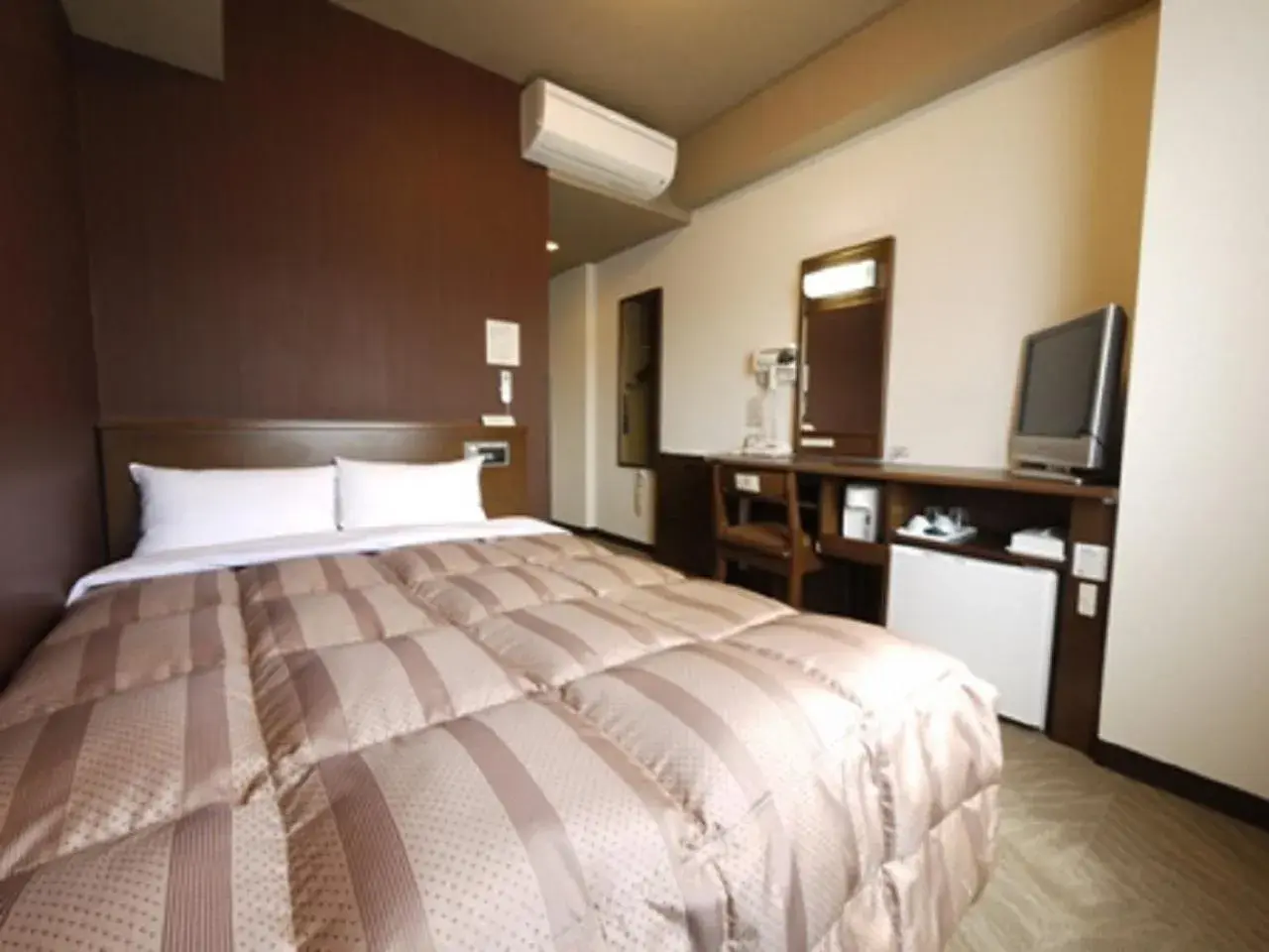 Bed in Hotel Route Inn Sendaiizumi Inter