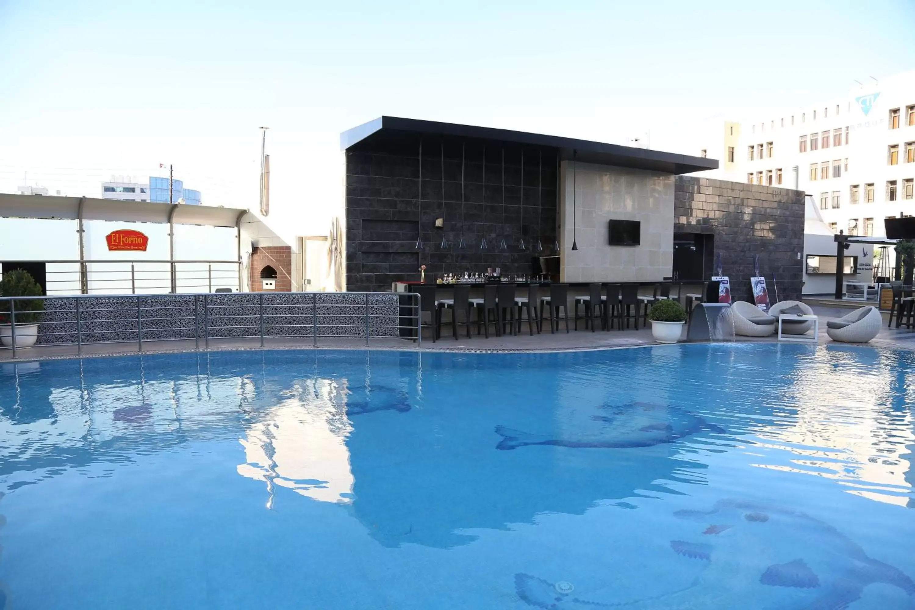 Lounge or bar, Swimming Pool in Kempinski Hotel Amman