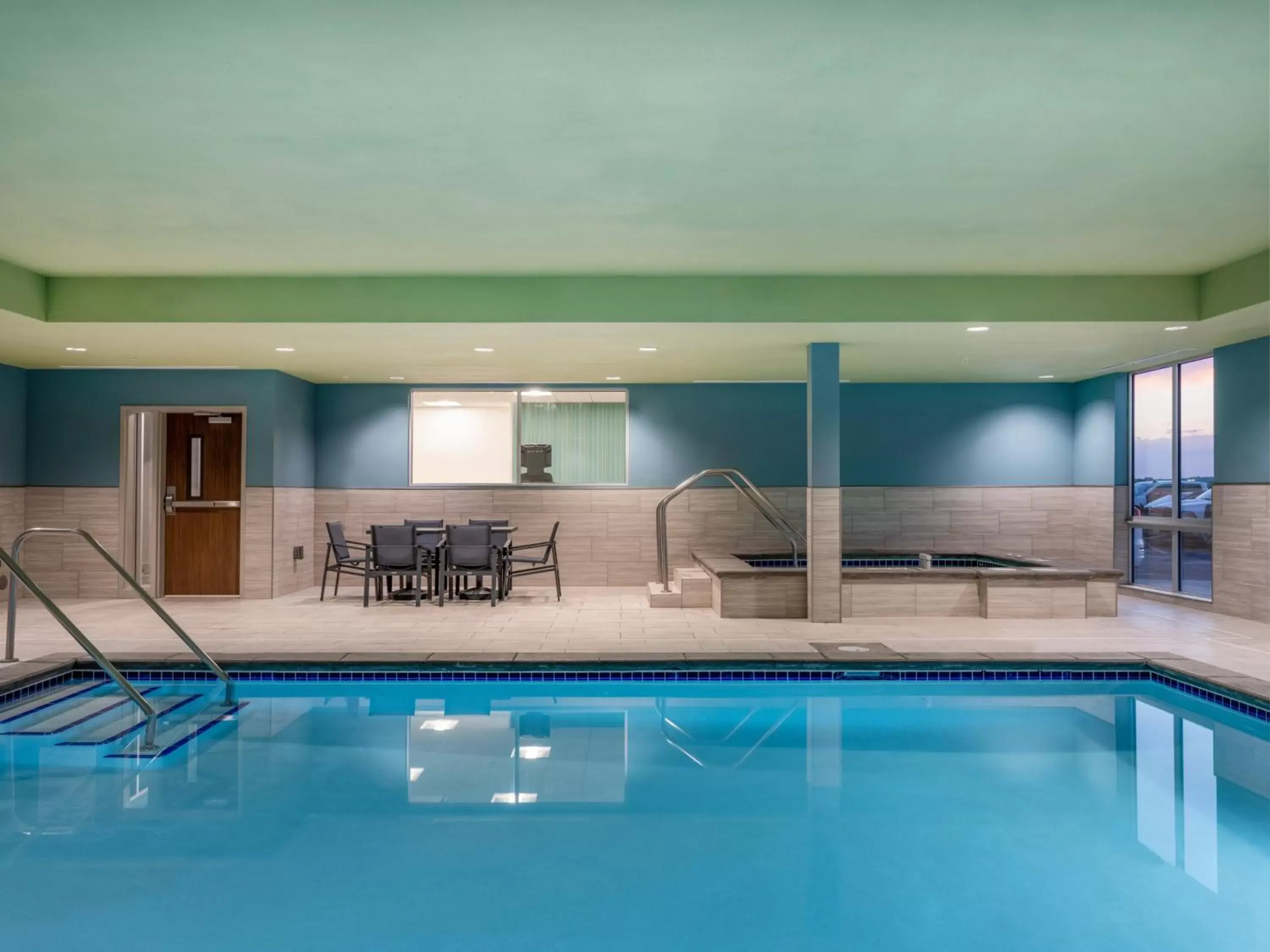 Swimming Pool in Holiday Inn Express & Suites - Watertown, an IHG Hotel