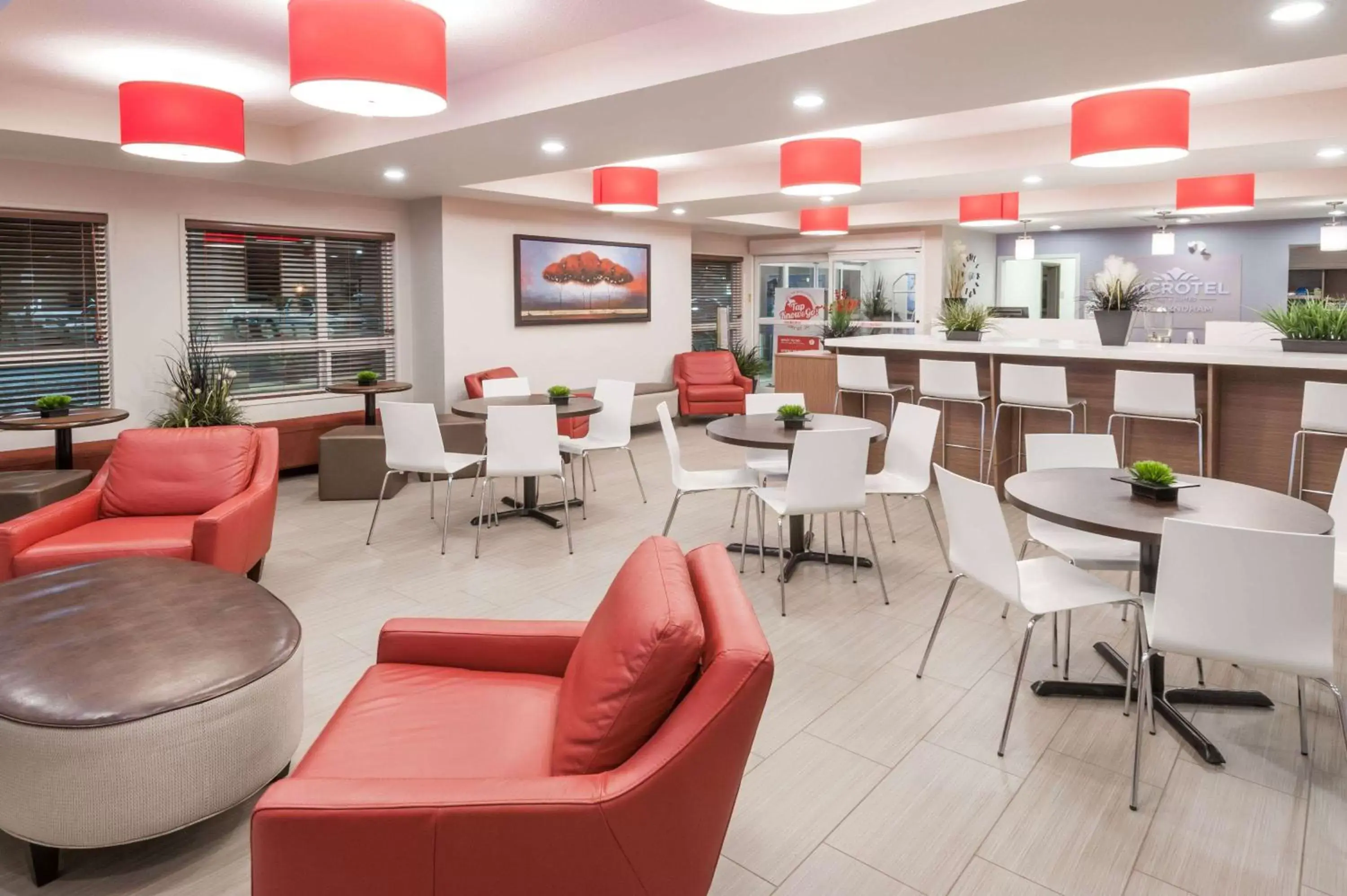 Lobby or reception, Lounge/Bar in Microtel Inn & Suites by Wyndham Fort Saint John