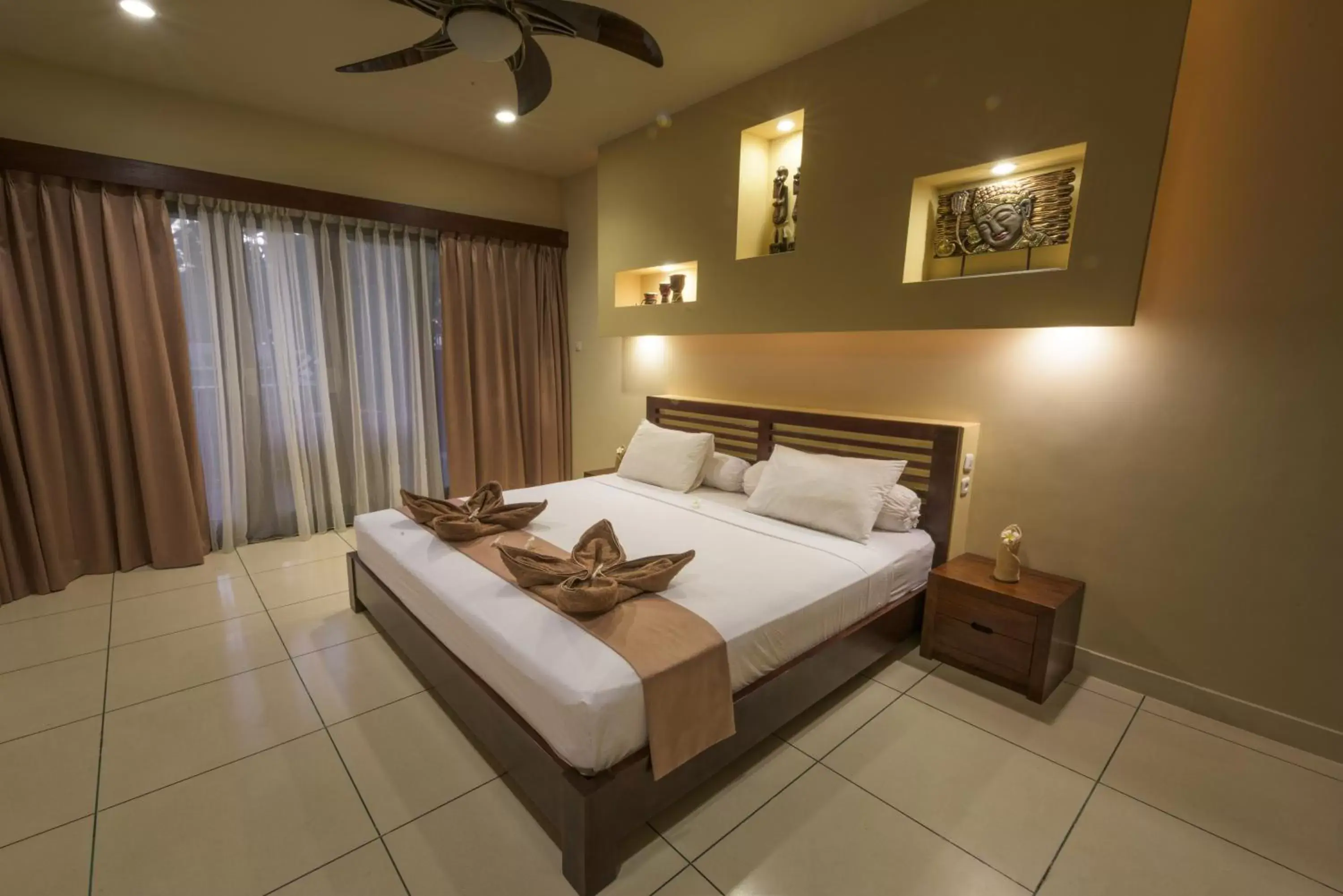 Bed in Mala Garden Resort and Spa