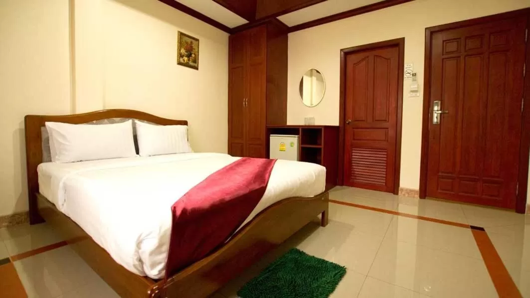 Bed in Bluebird Inn Pattaya