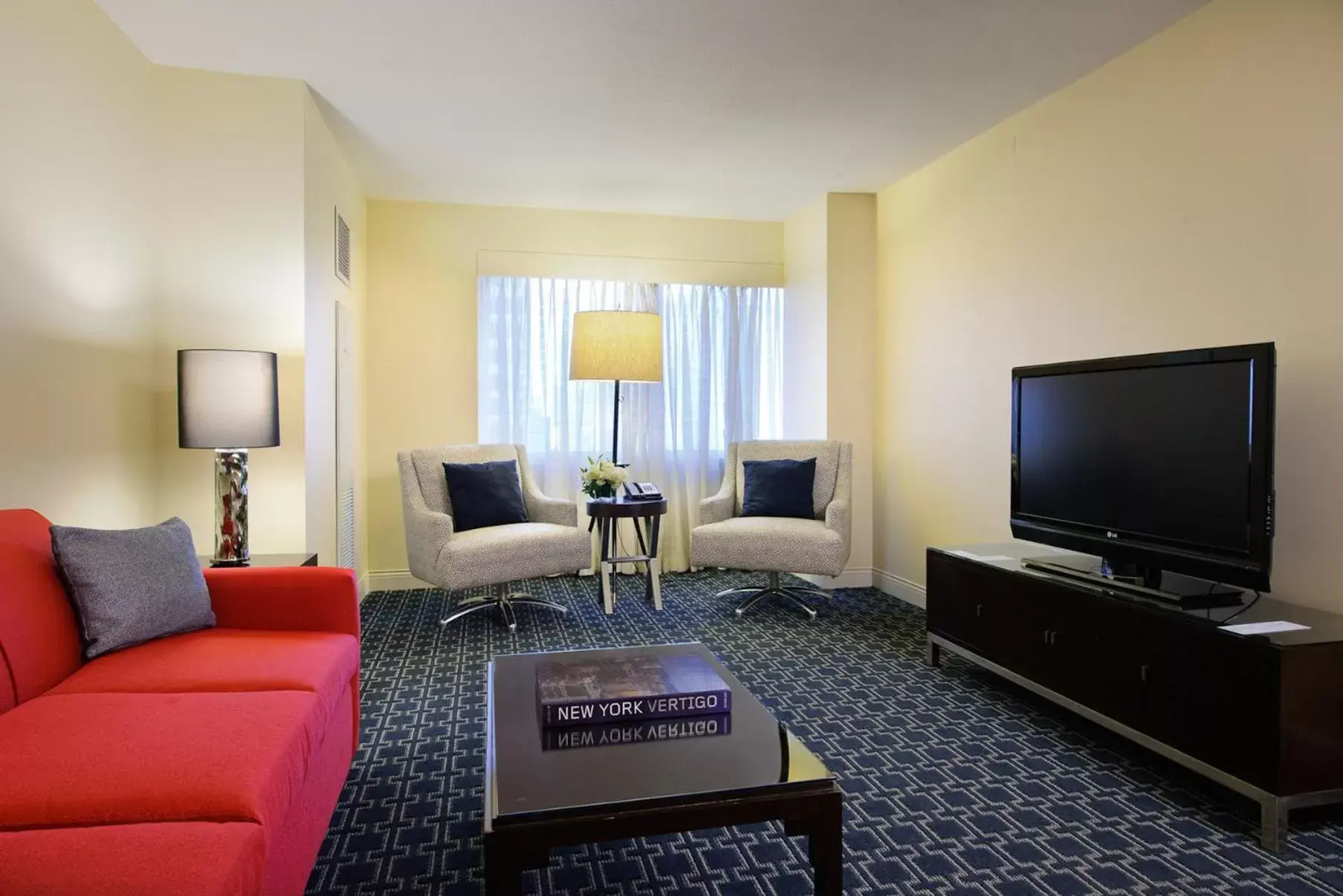 Photo of the whole room, Seating Area in Crowne Plaza Times Square Manhattan, an IHG Hotel