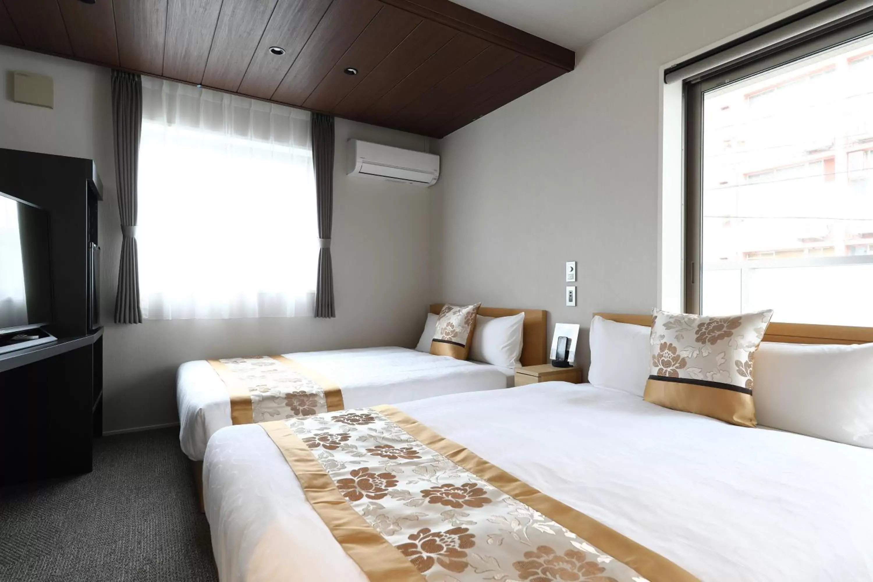 Photo of the whole room, Bed in GRAND BASE Hakata City