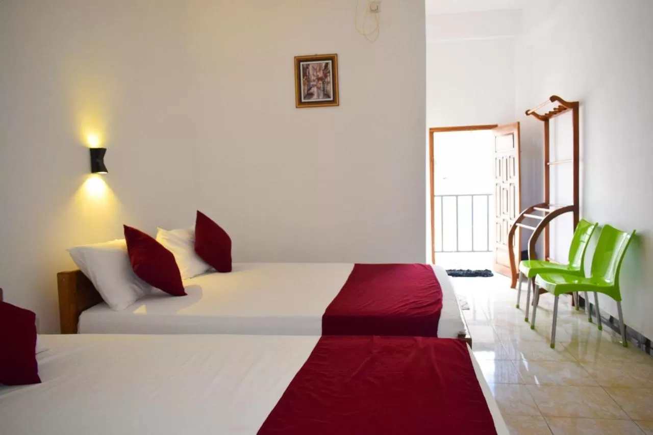 Bed in Hotel Theevanni Inn