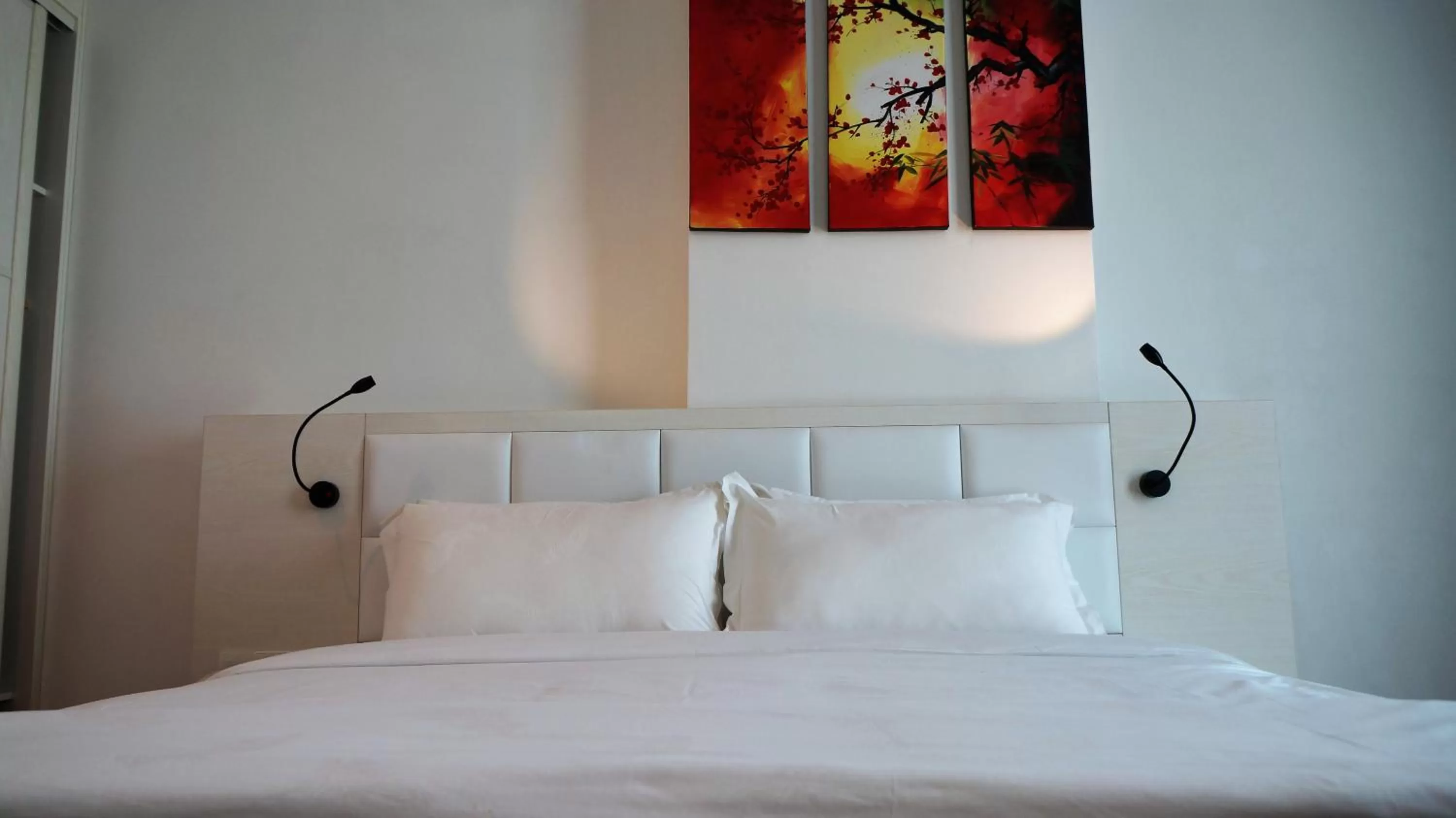 Bed in Pine Garden Hotel