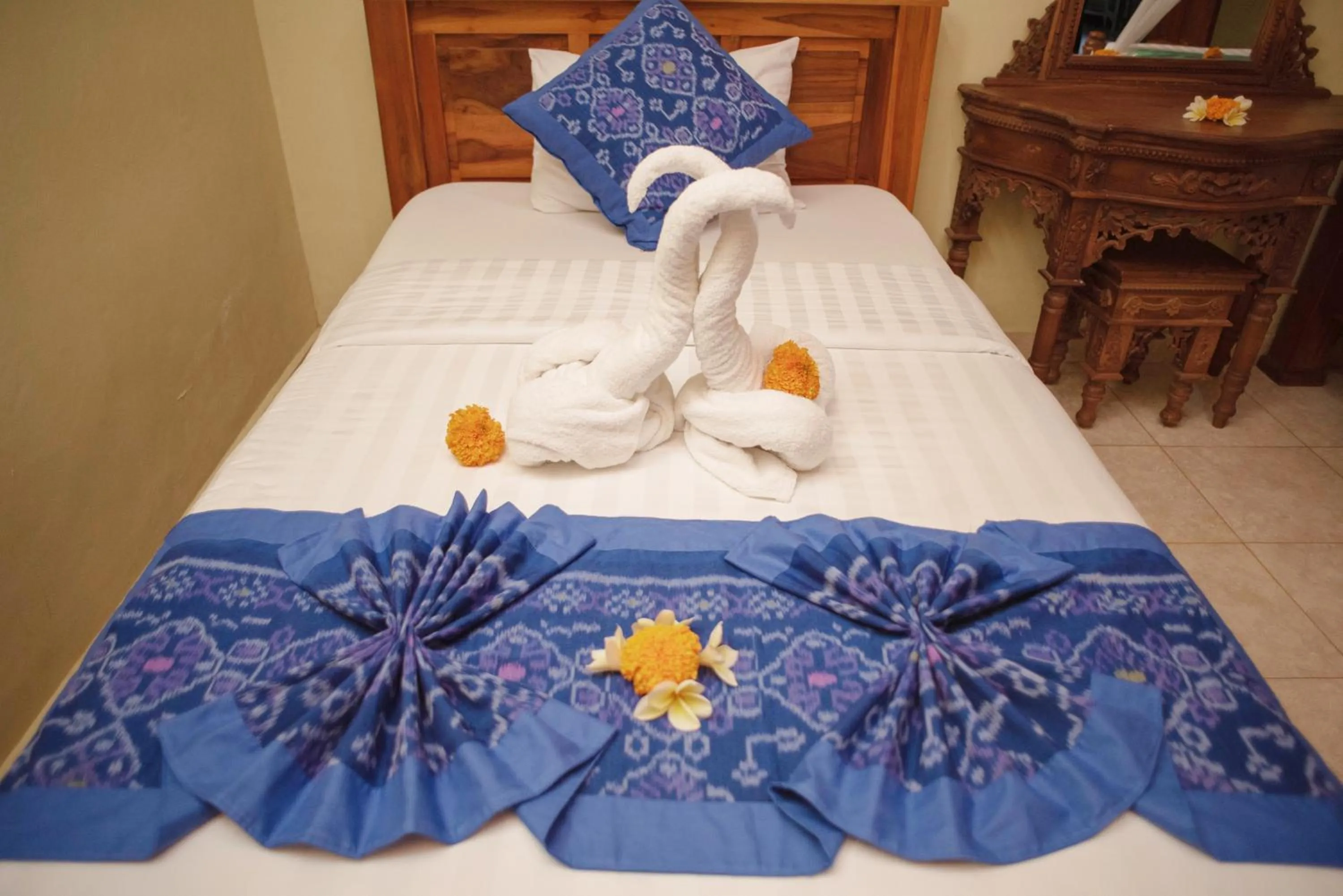 Bed in Suparsa's Homestay