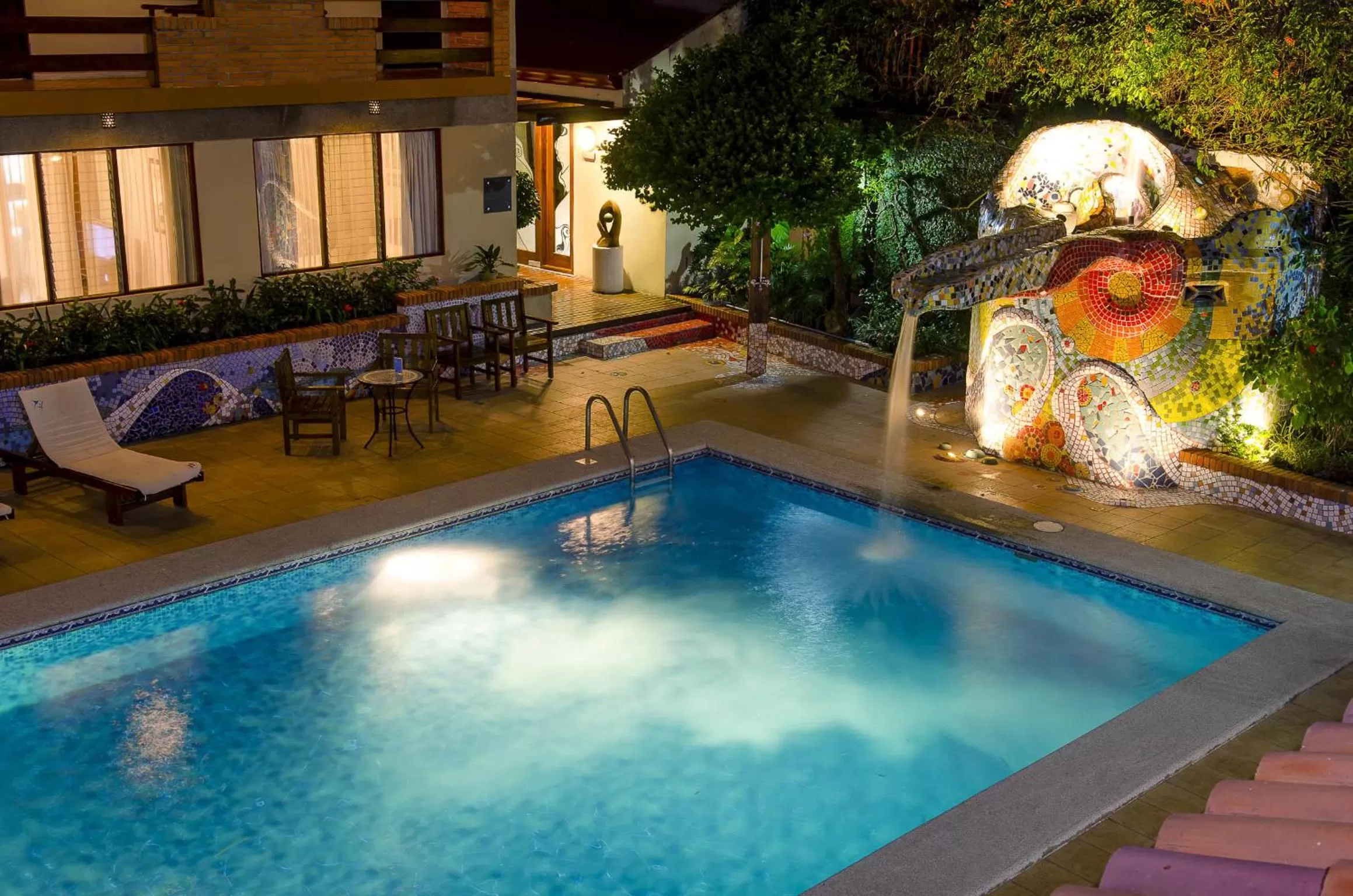 Swimming pool in La Sabana Hotel Suites Apartments