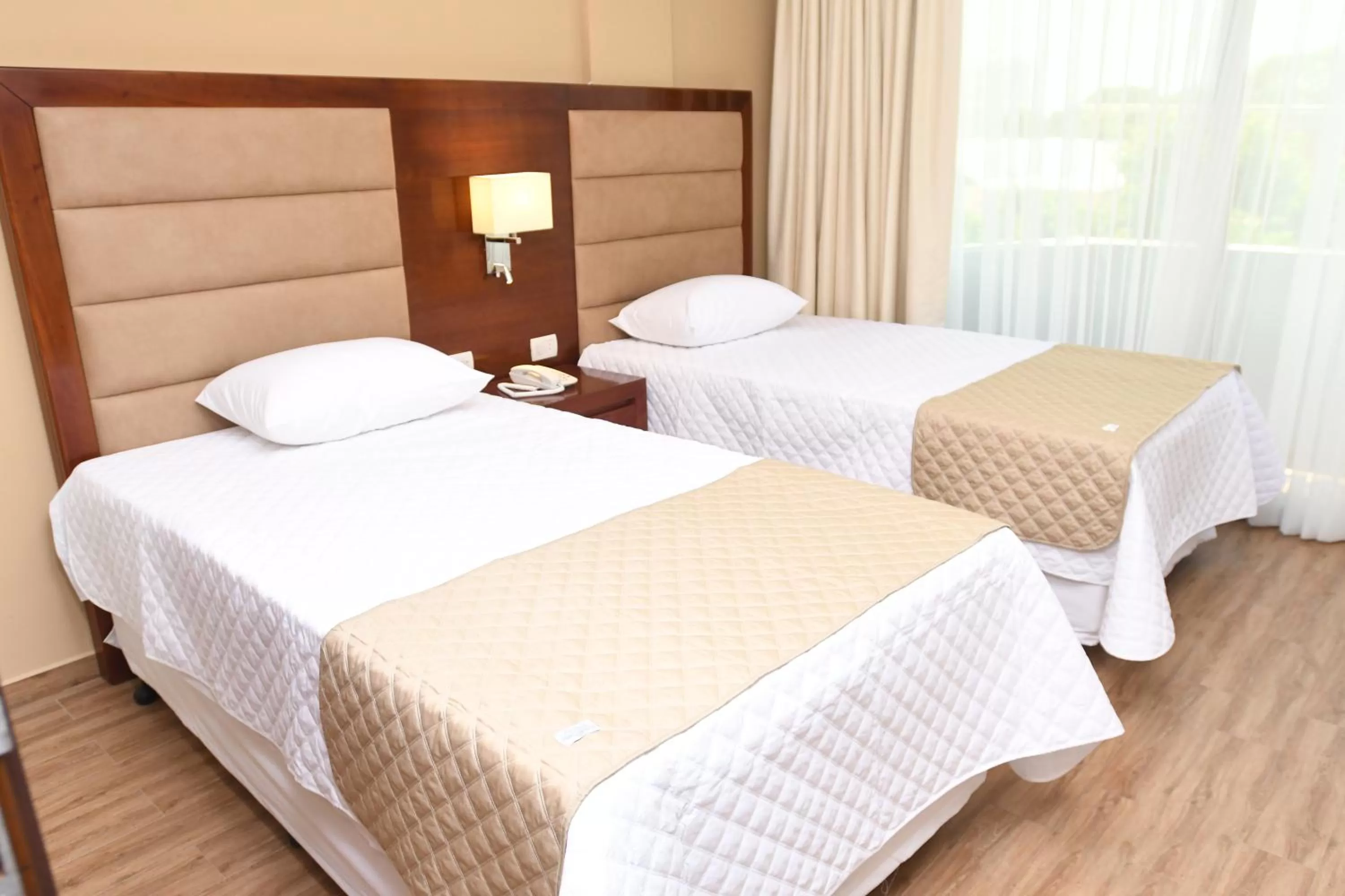 Bed in Taos Apart Hotel