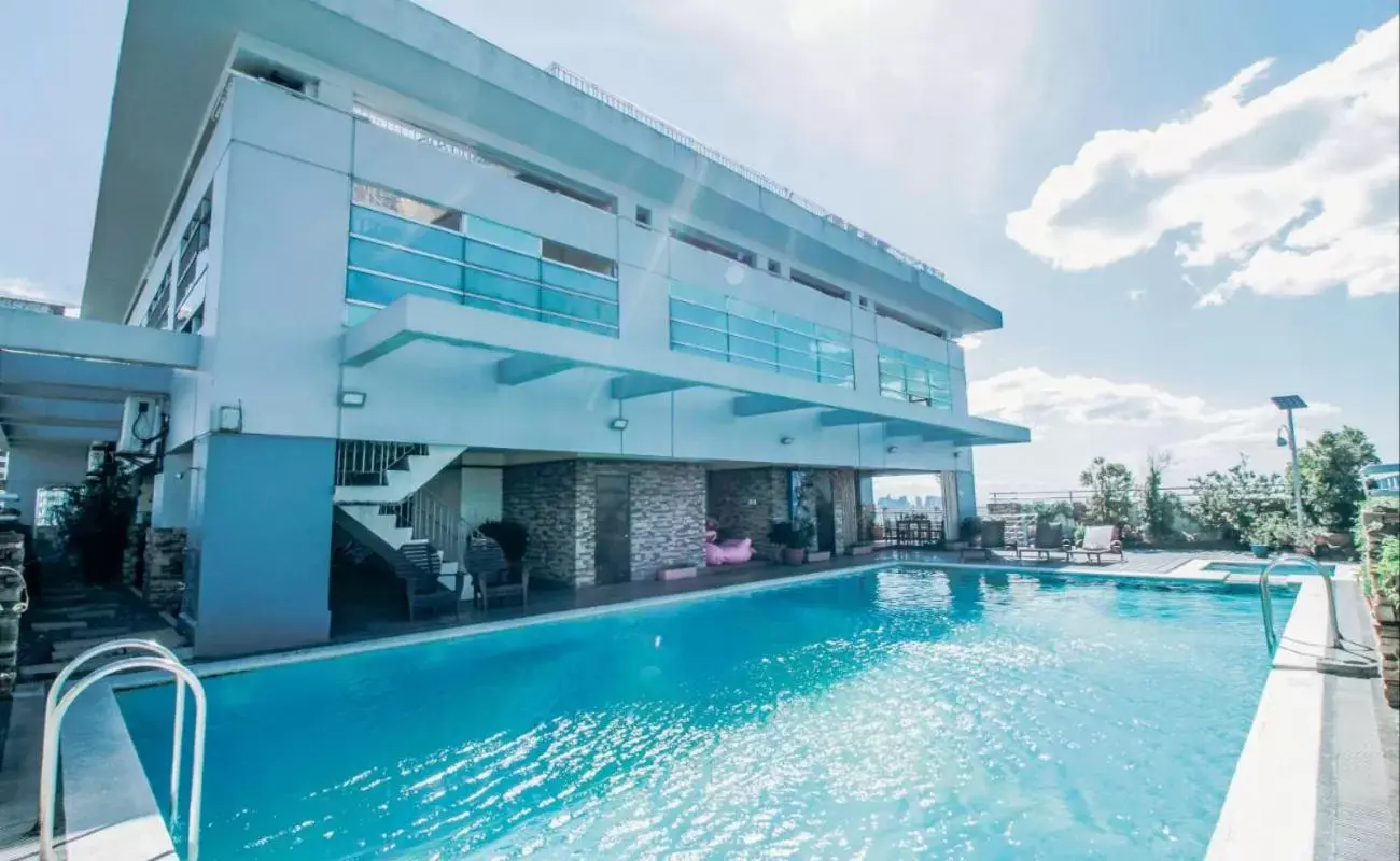 Swimming pool, Property Building in Greenhills Elan Hotel Modern