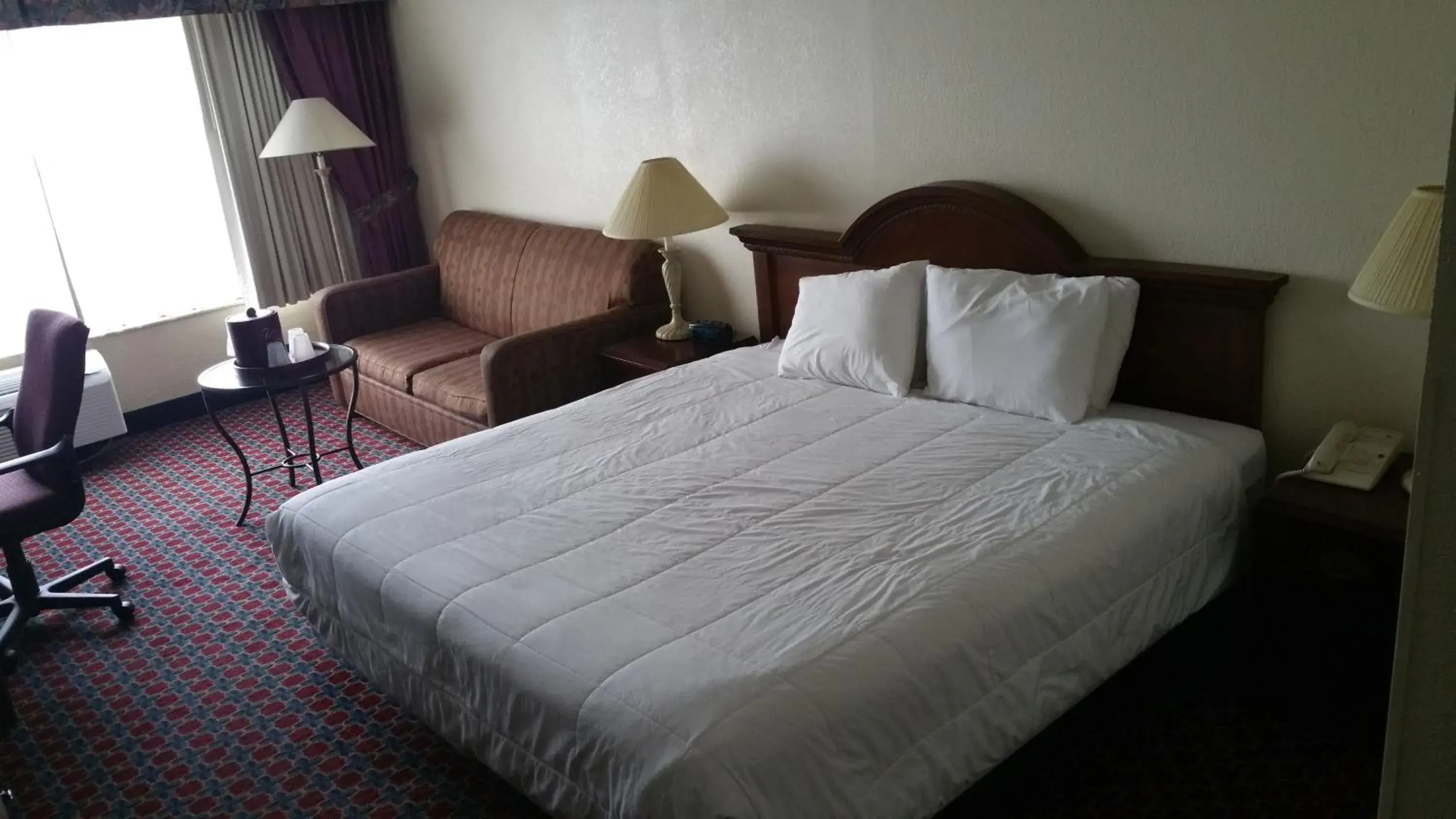 Bedroom, Room Photo in Imperial Swan Hotel and Suites Lakeland