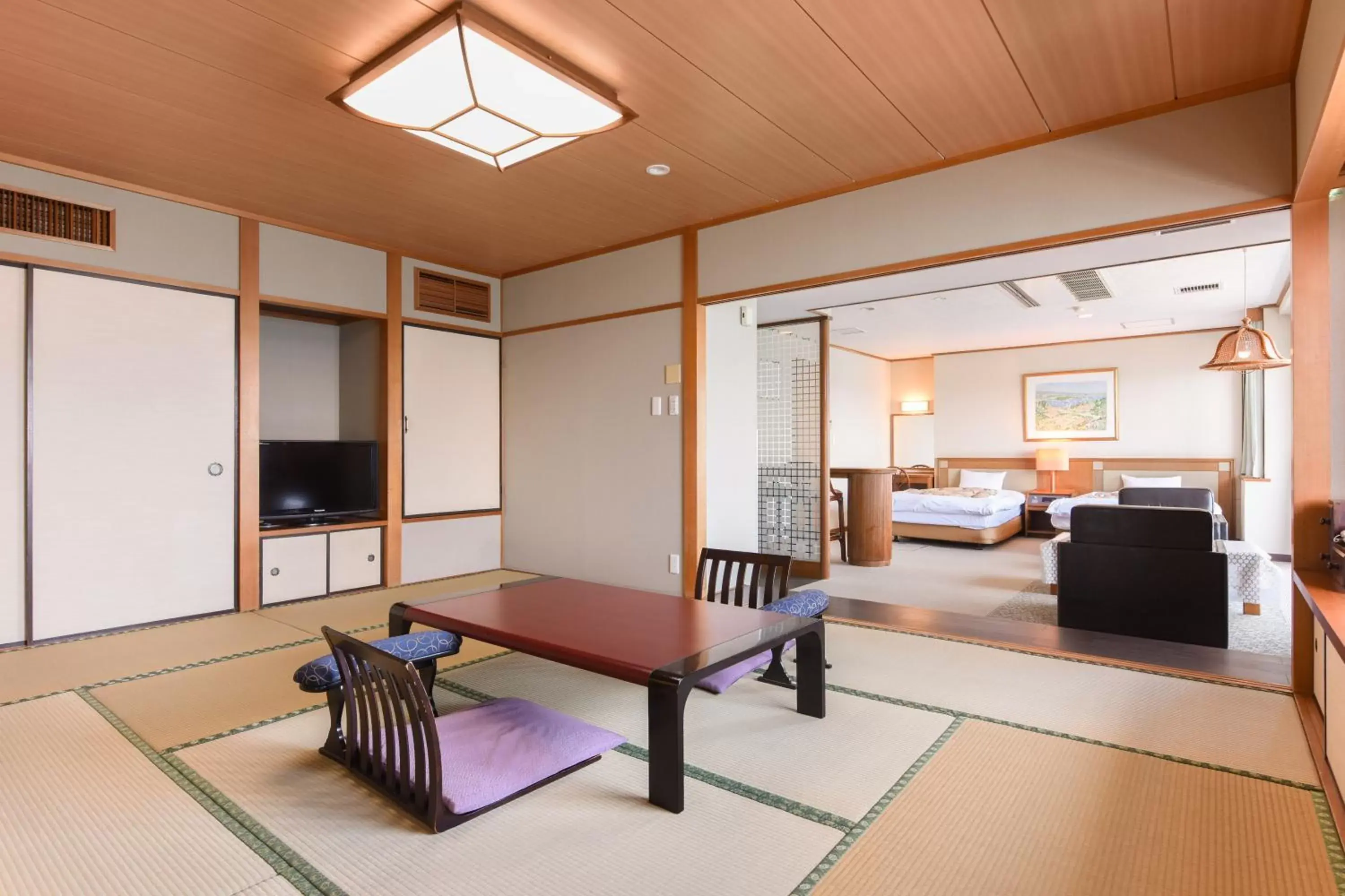 Bed, Seating Area in Ibusuki Kaijo Hotel