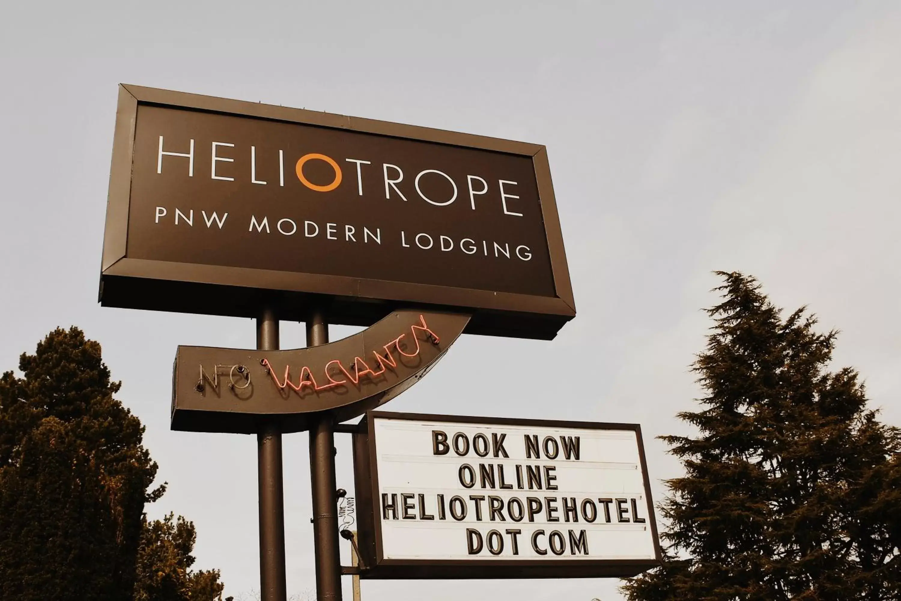 Property logo or sign in Heliotrope Hotel
