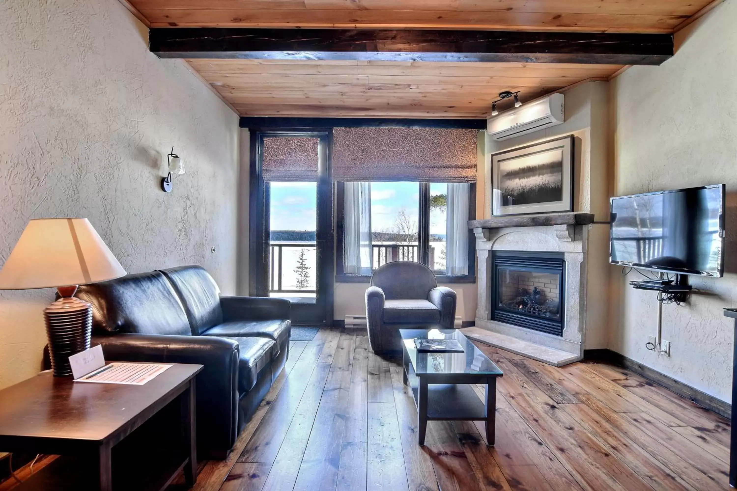 Seating Area in Les Condos Du Lac Taureau- Rooms & Condos