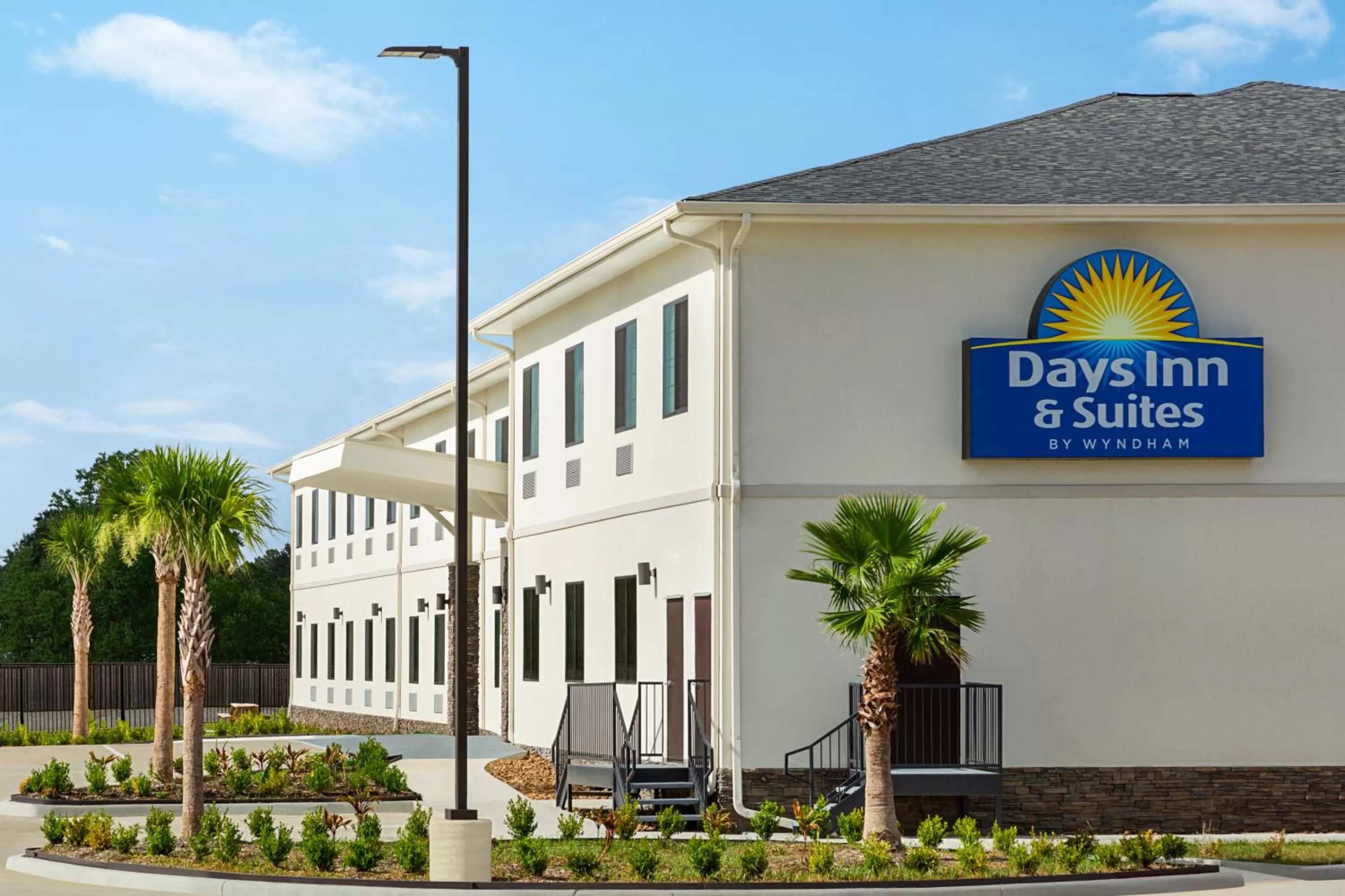 Property building in Days Inn & Suites by Wyndham Greater Tomball