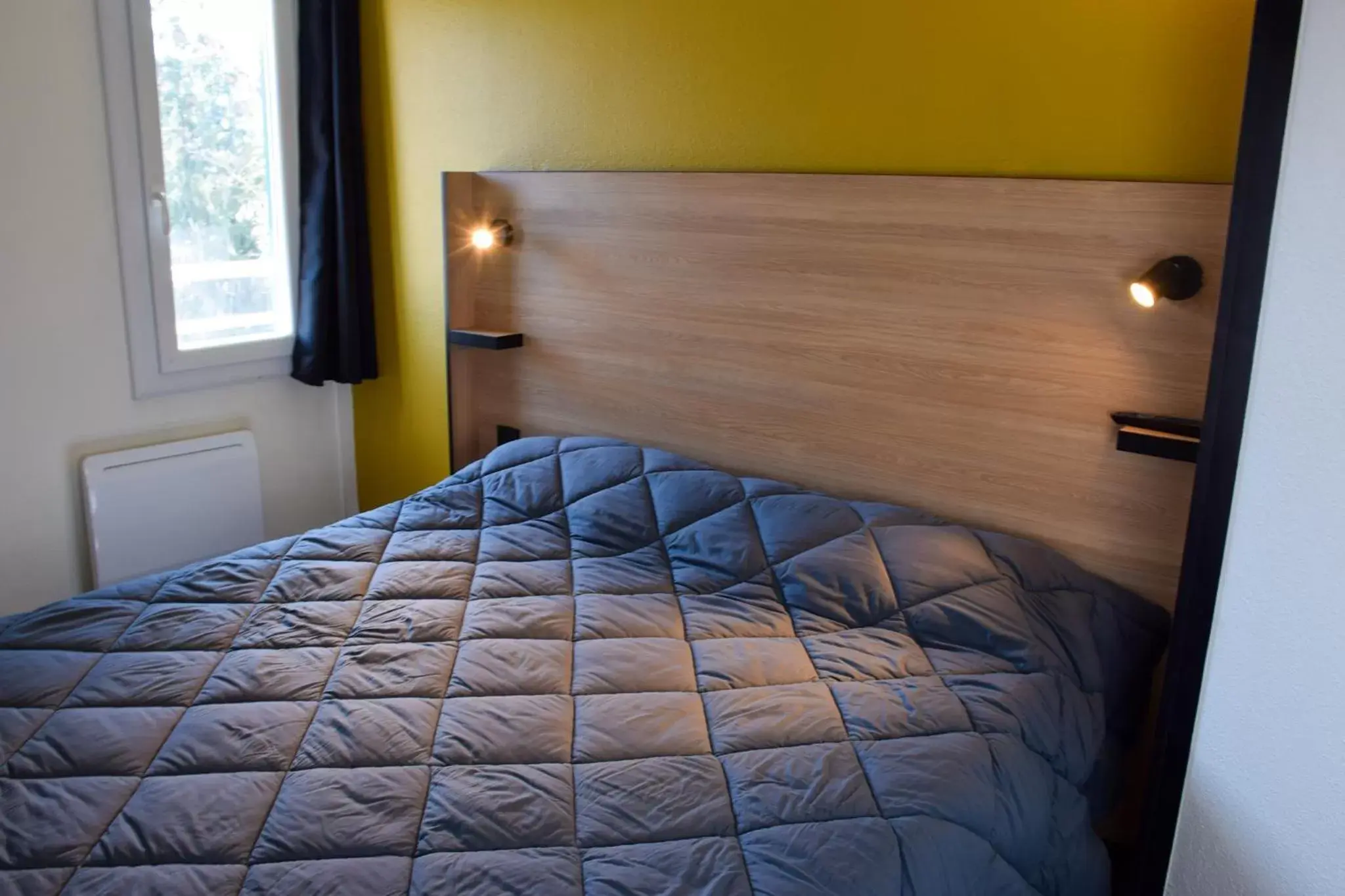 Bedroom, Bed in Premiere Classe Rodez