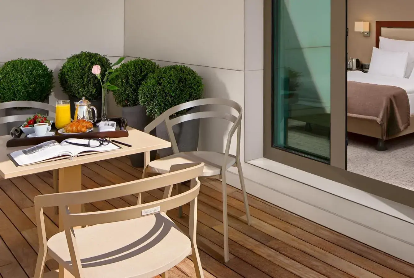 Balcony/Terrace, Bed in Occidental Ankara Balcony/Terrace, Bed in Occidental Ankara