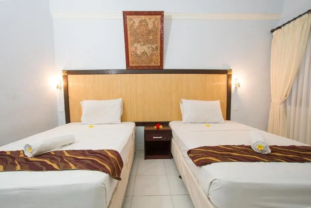 Bed in Abian Srama Hotel and Spa